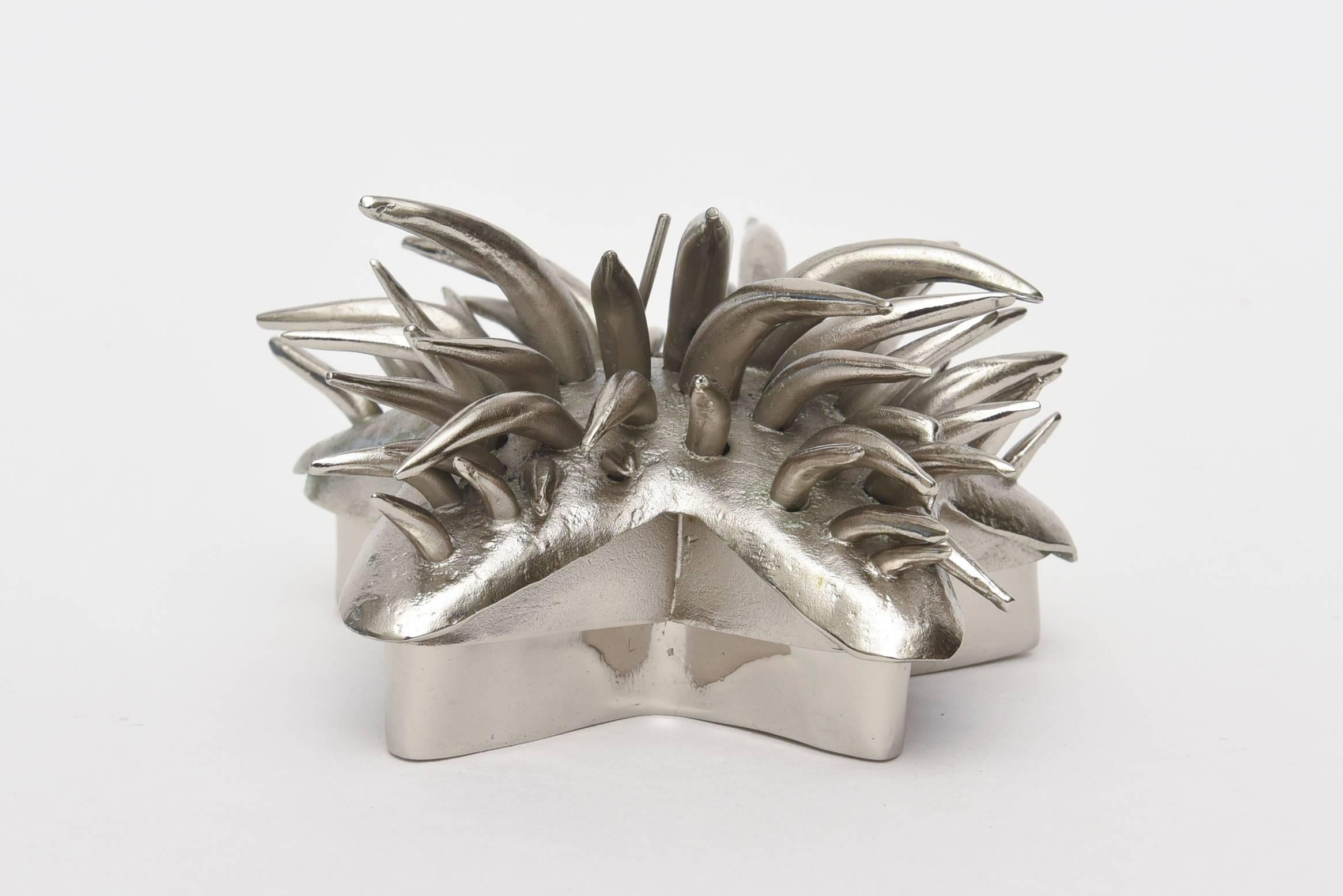 This interesting two-part box has been nickeled silver over white bronze on the top and nickel over blackened copper/ steel on the bottom. It is an abstract sea urchin top in starfish base form. Organic modern sculptural box/object. The tentacle