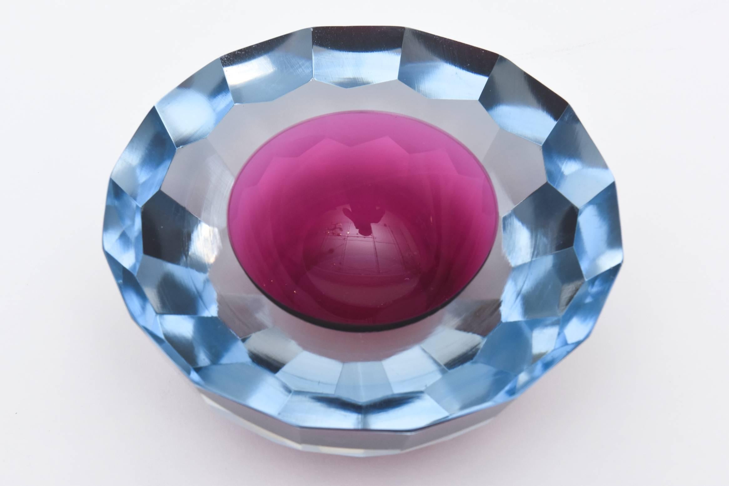 The brilliant colors of blue and violet of this spectacular and large diamond faceted flat cut polished glass Murano geode bowl is exquisite. These were also used for serving caviar.
When light hits the bowl, it glistens with radiance of color and
