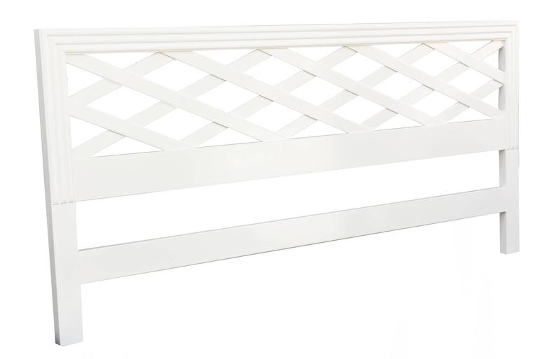 This cross diamond patterned newly white lacquered king size headboard is in the style of Paul Frankl. It is vintage and from the period of Mid-Century Modern. It has been newly re-lacquered in white. The measurements are as follows. 80
