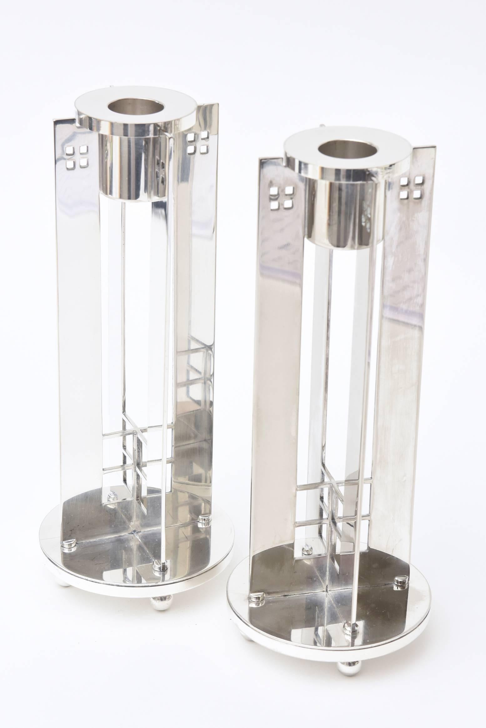 These modernist and architectural signed silver plate Italian candlesticks are the work and collaboration of Richard Meier; the famed architect and the company
Swid Powell. They are entitled 