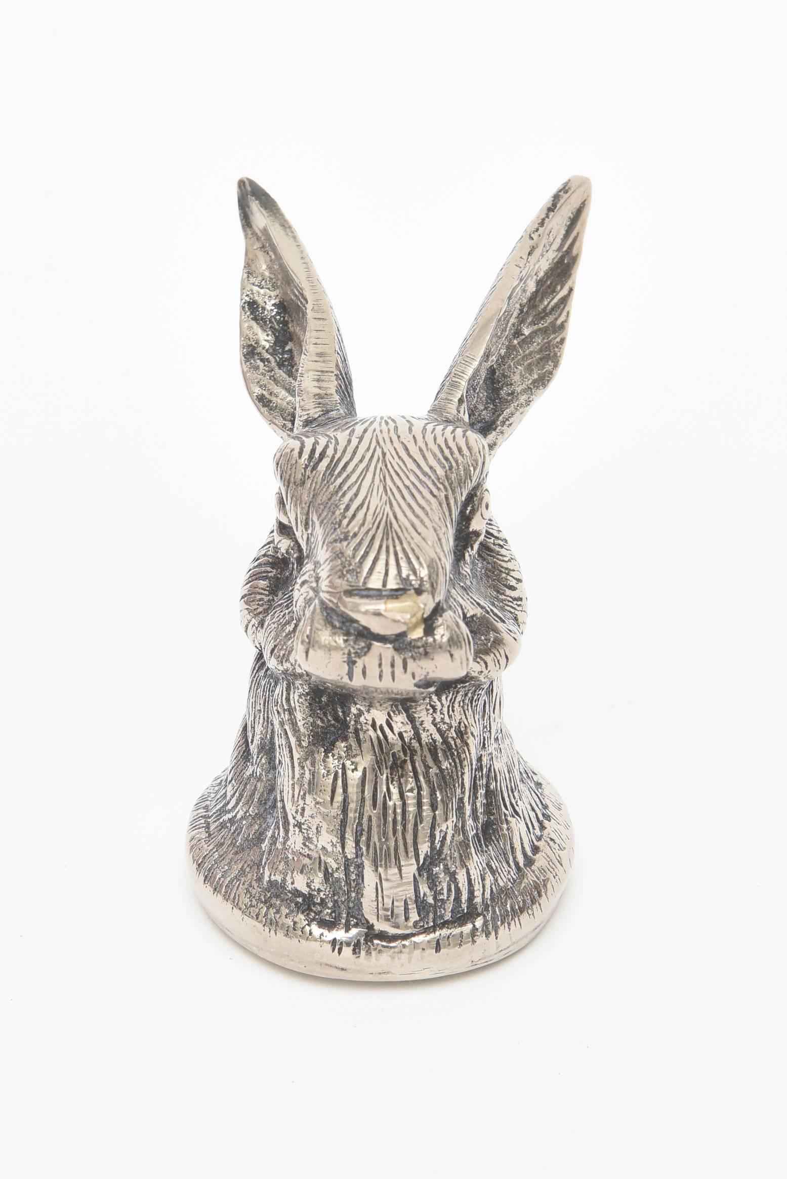 This Italian signed Gucci silver plate bottle opener is whimsical and not your ordinary barware piece.
A rabbit is searching for the right bottle to open. Stands vertical. It is marked "Gucci Made in Italy" It is textured metal.
Fun!
 