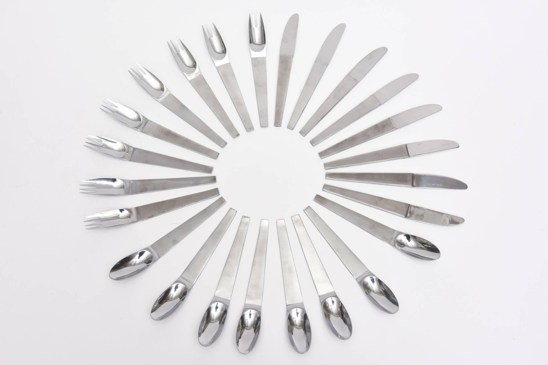 This timeless and modernist flatware set is attributed to the work of Carl Auböck. It is Mid-Century Modern. There are 24 pieces. It is stainless steel and has a crown hallmark on it. Makes a beautiful table setting.

  