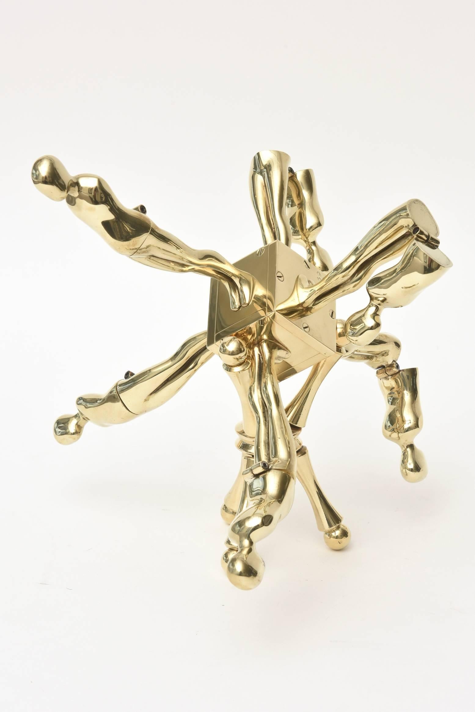 This amazing two part one of kind Ernest Trova vintage sculpture is polished brass. It is from his falling man subject and what he is most coveted for and known for. Each part as you can see from the photos reticulate downward. At any given time,