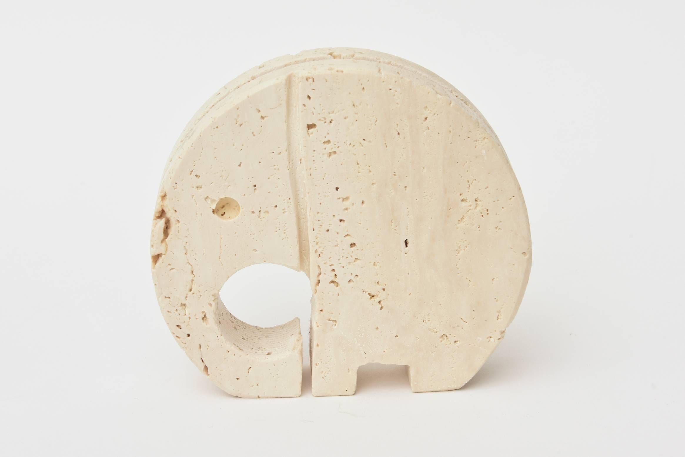 This Mid-Century Modern Italian travertine Italian stone letter holder of a good luck elephant is by the designer Fratelli Manelli who worked in travertine. Great for a desk accessory or hallway entry. It is from the 1960s.

 