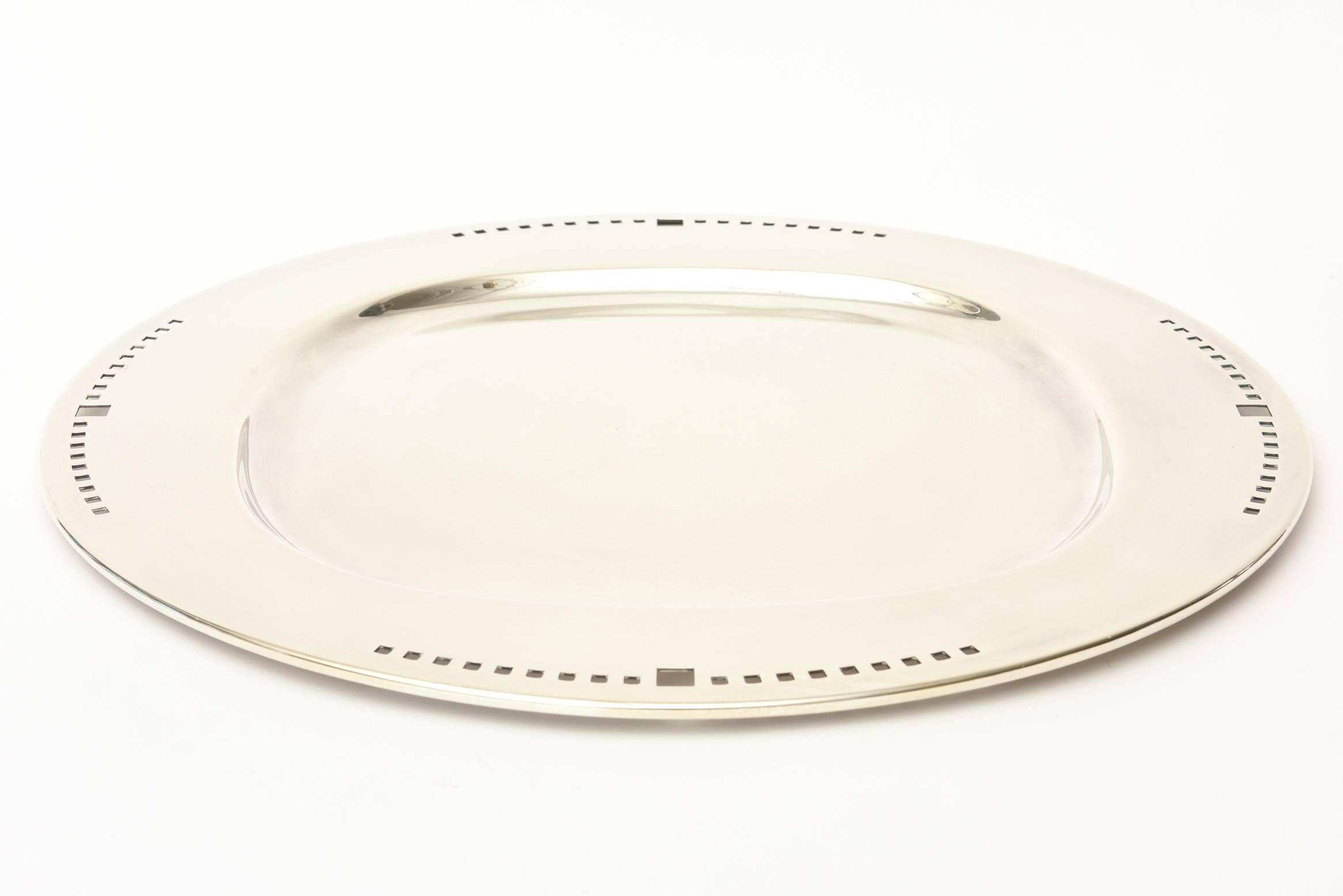 This architectural tray signed and designed by the architect Richard Meier for Swid Powell
is called the skyscraper tray. It is hallmarked on the back. Made of silver-plate in
Italy.
These are a bit harder to come by these days.
Timeless and