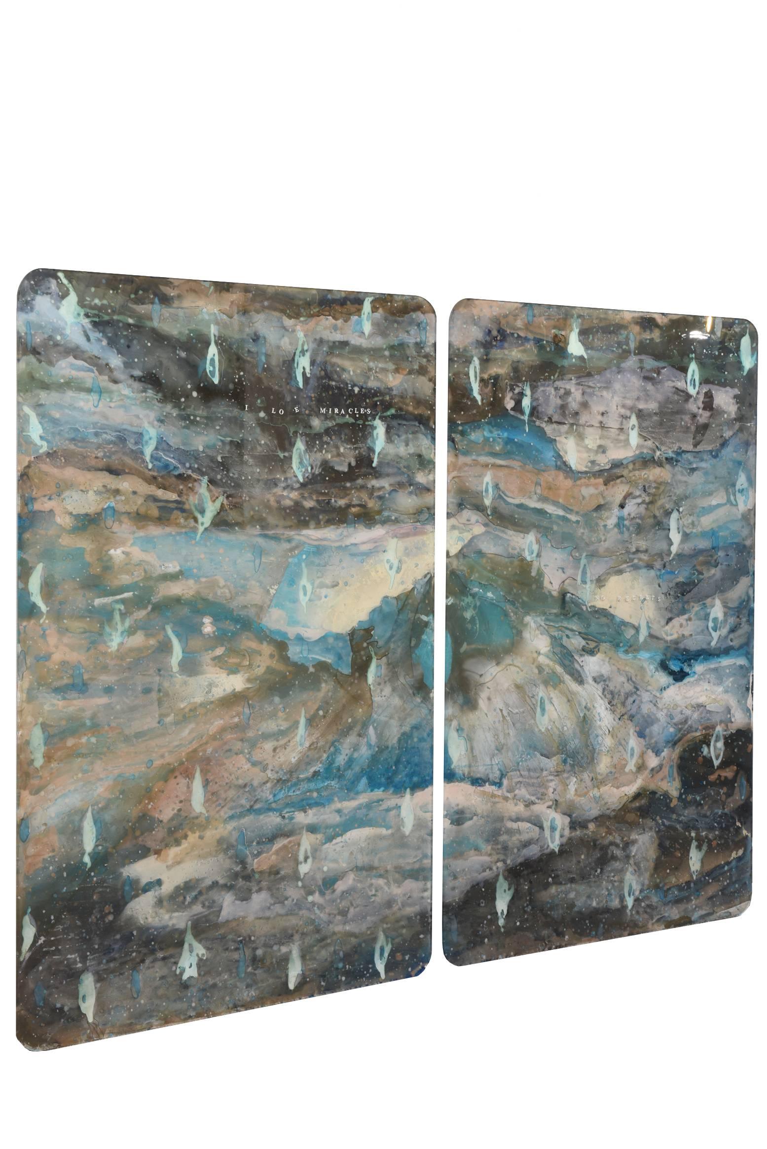 This stunning and amazing mixed-media work of art by artist and painter Robert Bery changes in forms and landscape as you look at it from different angles and ways. The colors are spectacular and also change. The mixed media consist of layered