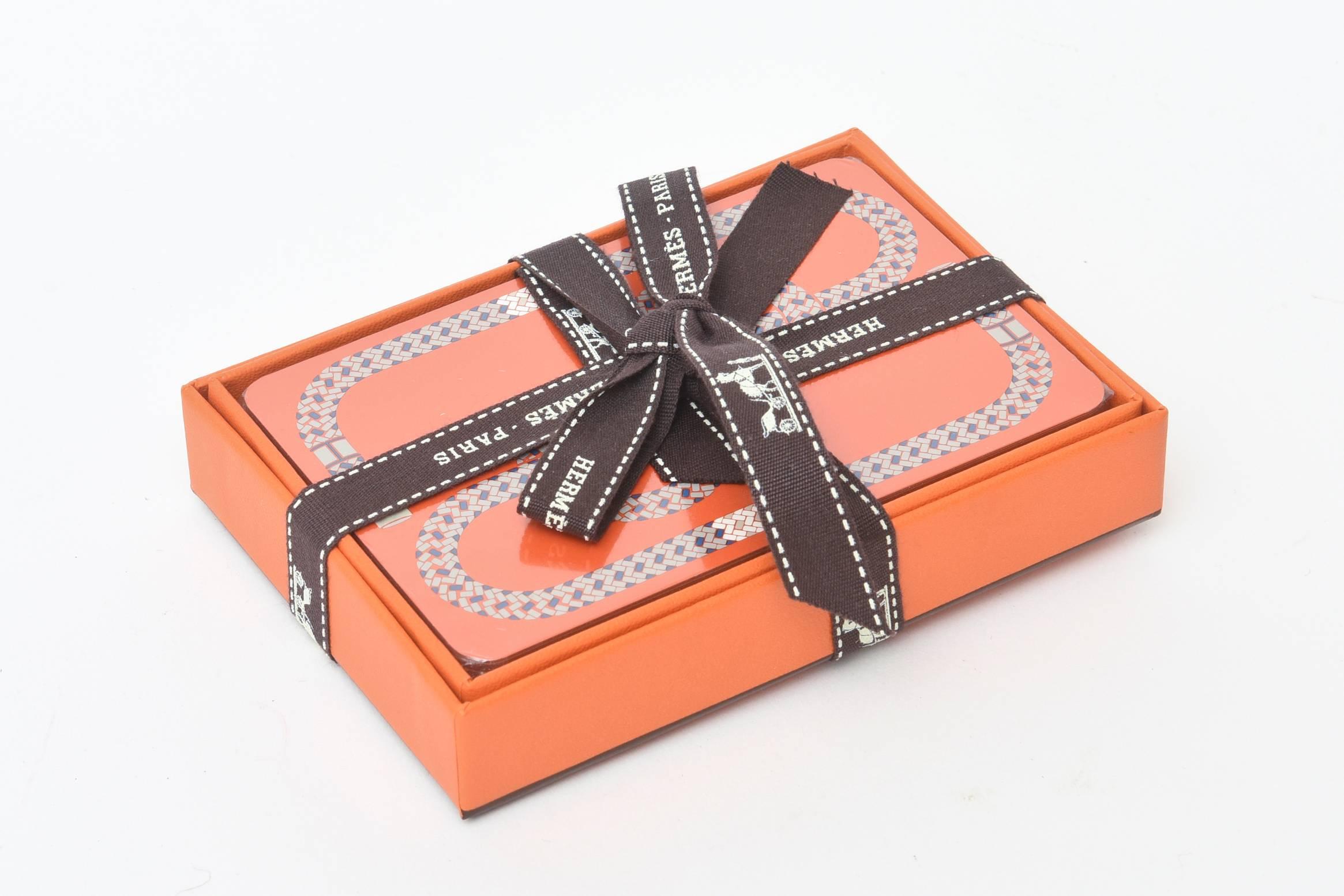 These hermetically sealed French Hermes playing cards have a geometric pattern. They are still sealed and wrapped up. Never used. These also make a great gift for the host or hostess or oneself. Also a great holiday gift as well.
  