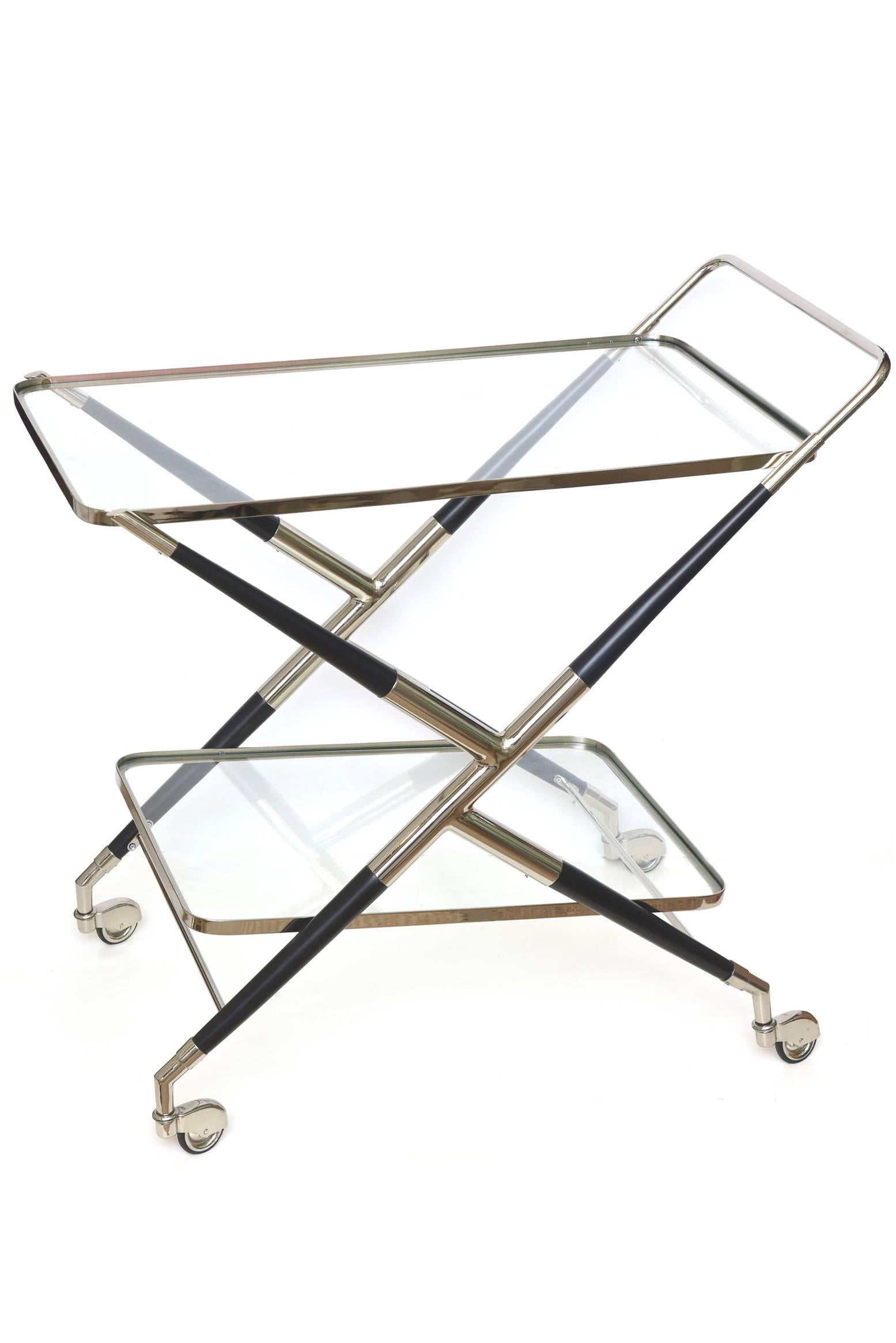 This Mid-Century Modern newly restored Cesare Lacca X-frame two-tiered bar cart is Italian and hallmarked made in Italy Mod Dept Cesare Lacca. The original wheels that also have been nickeled silver are very chic. This entire bar cart has been