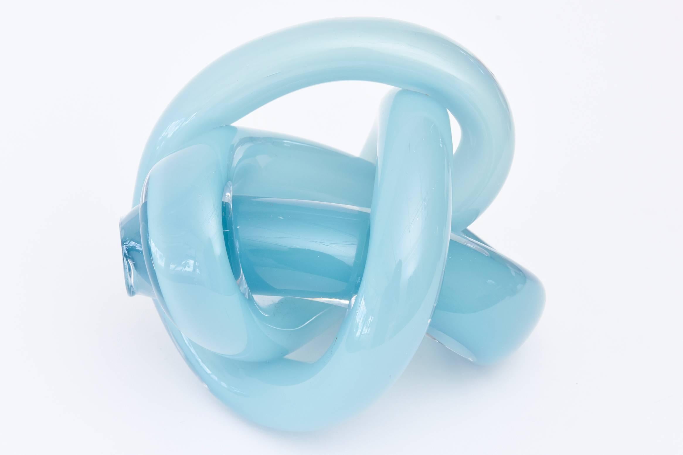 This twisted signed vintage hand blown glass sculpture is organic meets modern glass. The color is a gorgeous sexy aqua and each way you turn it, it is a different perspective of twisted hand blown glass. It is from the 1970s and is signed but not