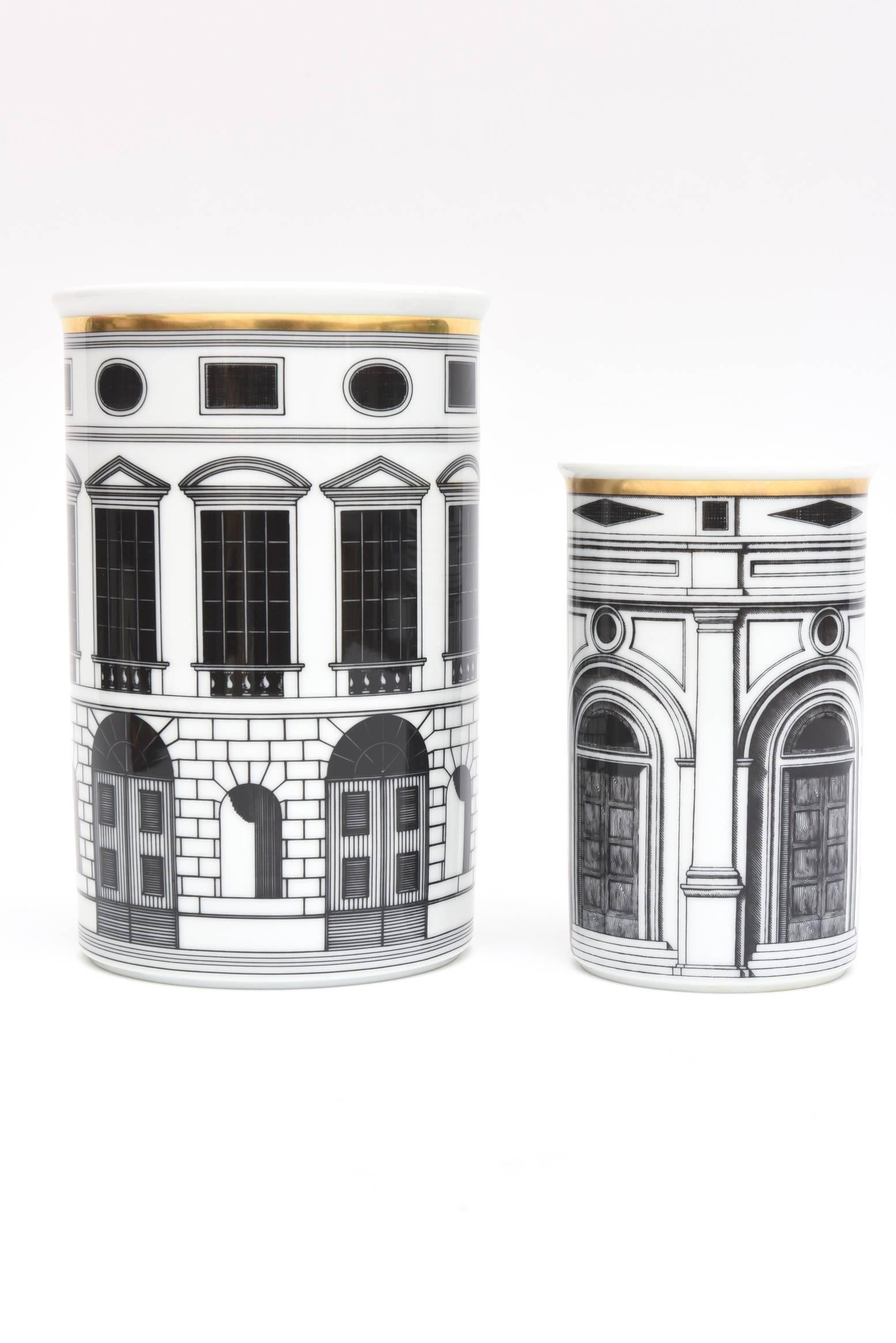 These lovely and architectural porcelain vases/vessels were made by Rosenthal for Fornasetti in the 80's. The look great as a pair. The smaller vase is 3.5