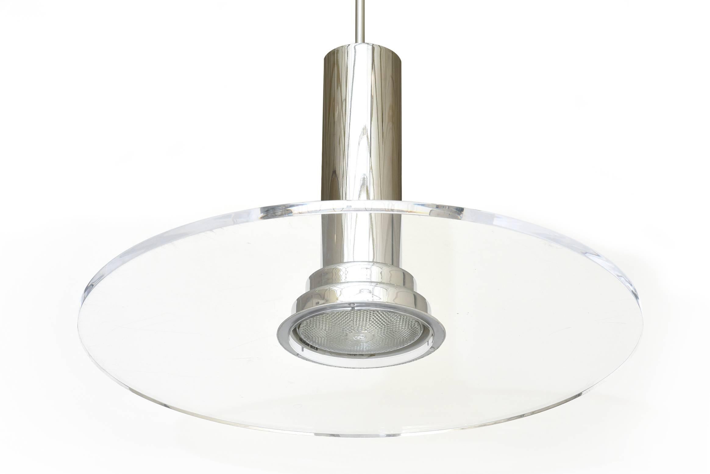 The inspiration of deco revival comes to mind in this simple and modern pendant lamp. It is by Fredrick Ramond. This is from the 1980s.
It is signed and has good light.
 