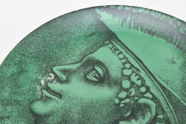This vintage Fornasetti plate is numbered three and is from the collection of the Roman coin series. All hallmarked on the back. This is a very uncommon plate and hard to come by. Green for goodness. A lovely gift this would make for the Fornasetti