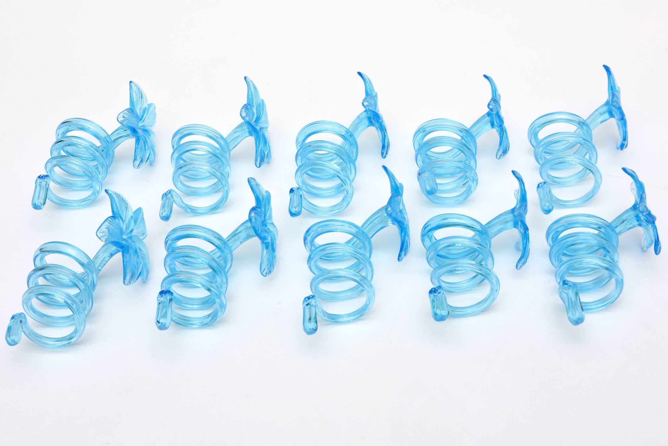 Modern Collection of Nine Hand Blown Glass Coiled Turquoise Blue Flower Napkin Rings