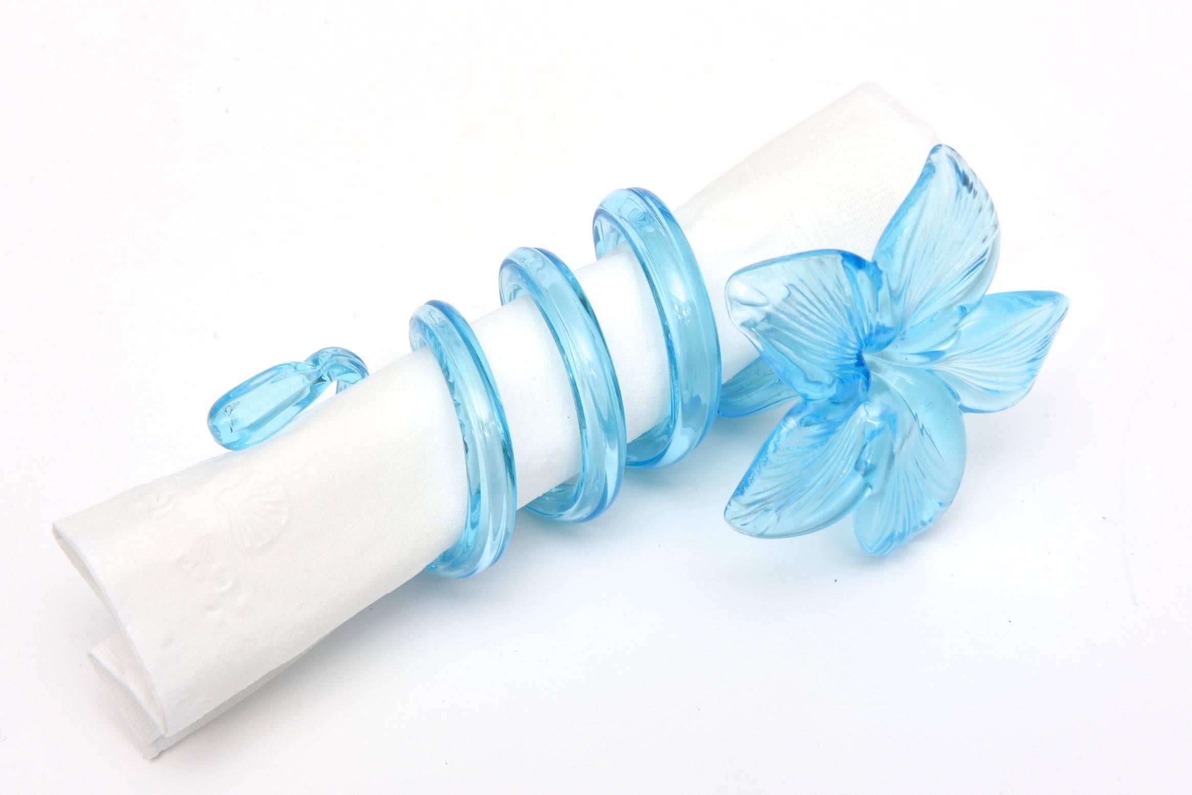 American Collection of Nine Hand Blown Glass Coiled Turquoise Blue Flower Napkin Rings