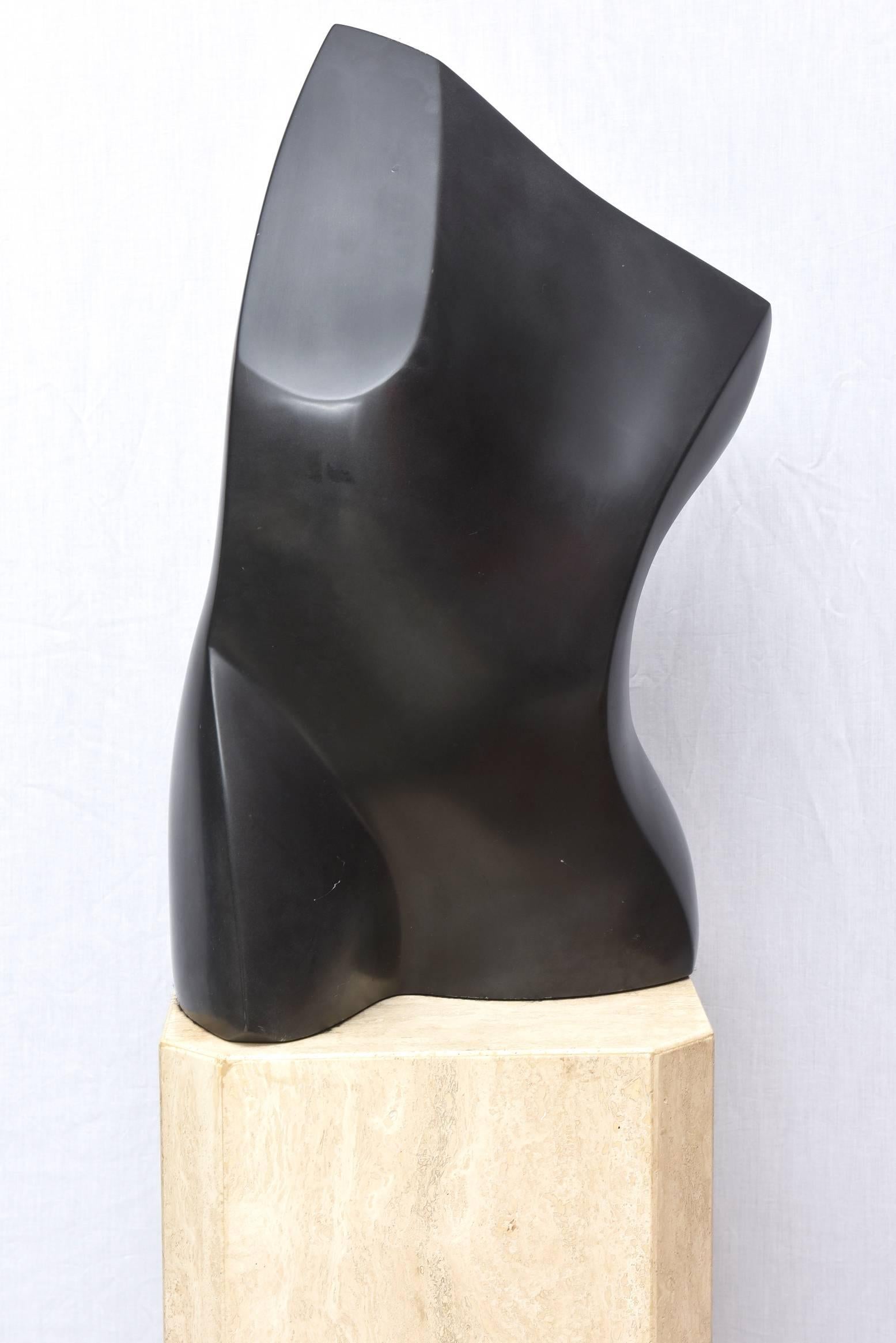 This wonderful monumental cast black stone limited edition floor sculpture is by the noted Japanese artist; Masatoyo Kishi. He was born in Sakai Japan in 1924, lived in America and passed away in 2017. His education focused greatly in psychics and