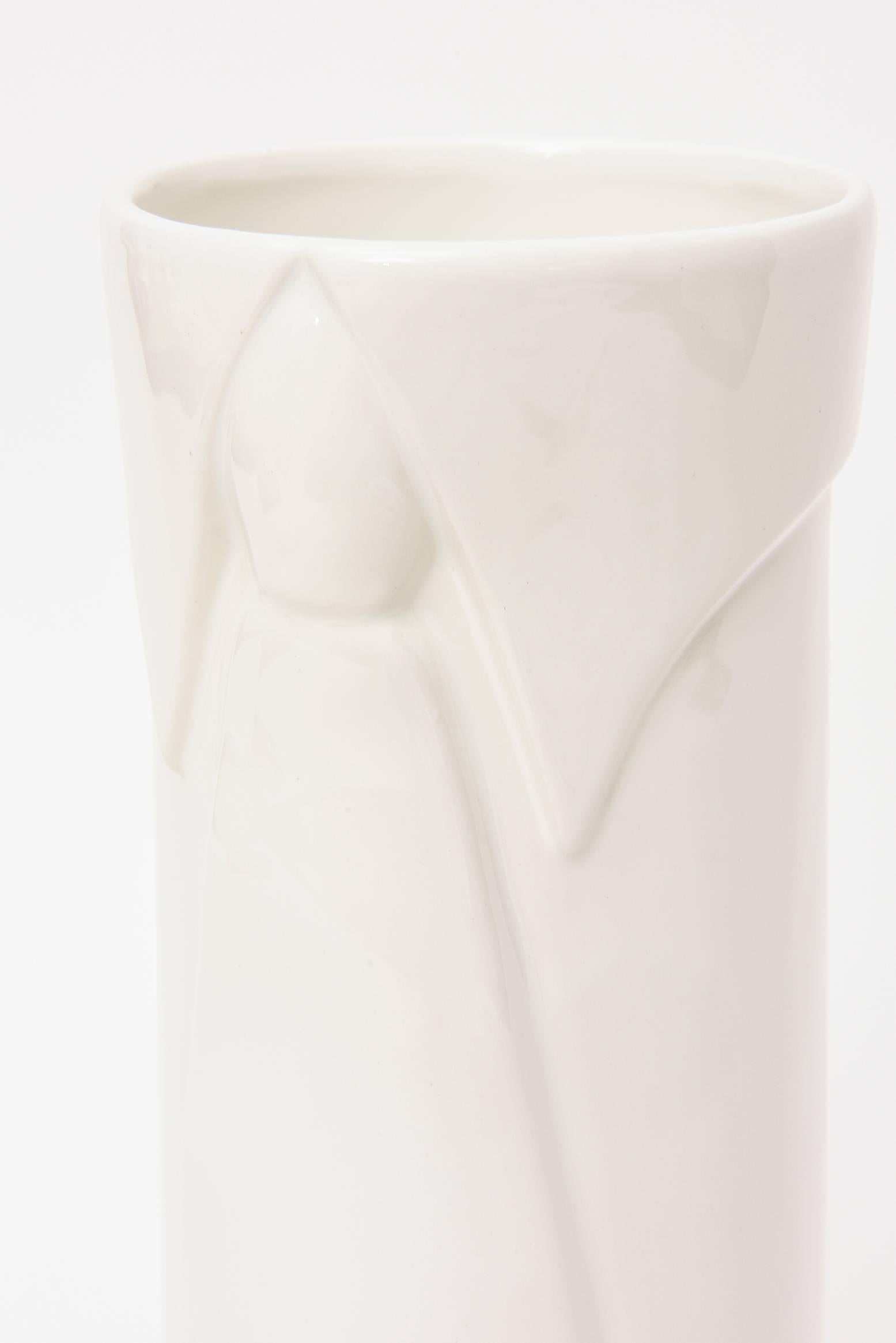 Tie one on in this whimsical Italian Raymor vintage ceramic vase that is a circular shirt with a tie and collar. It is conversational and  Italian pop art. These are hard to come by now. It is from the 1970s. The ceramic is off-white to white glazed