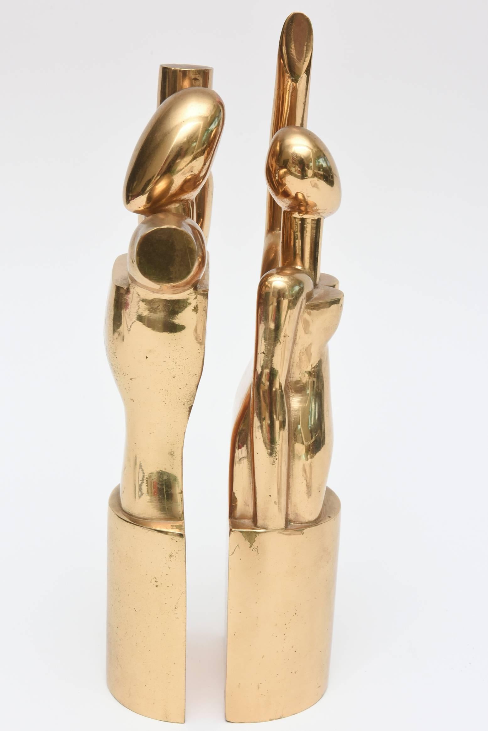 Bronze Paire de sculptures cubistes modernistes d'hommes et de femmes vintage signées Rabaey et datées en vente