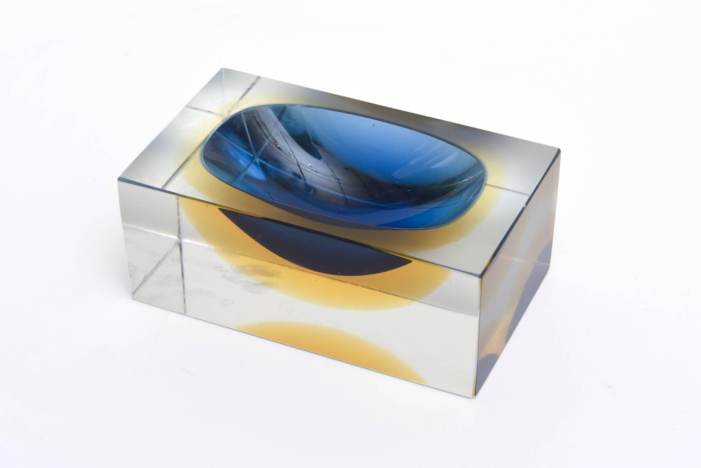 This small but wonderful Italian Murano vintage Sommerso Flavio Poli glass bowl, dish or vide poche in vivid colors of brilliant blue and yellow, and clear Sommerso form will be a great addition to any table or desk. Hard to come by in the rectangle