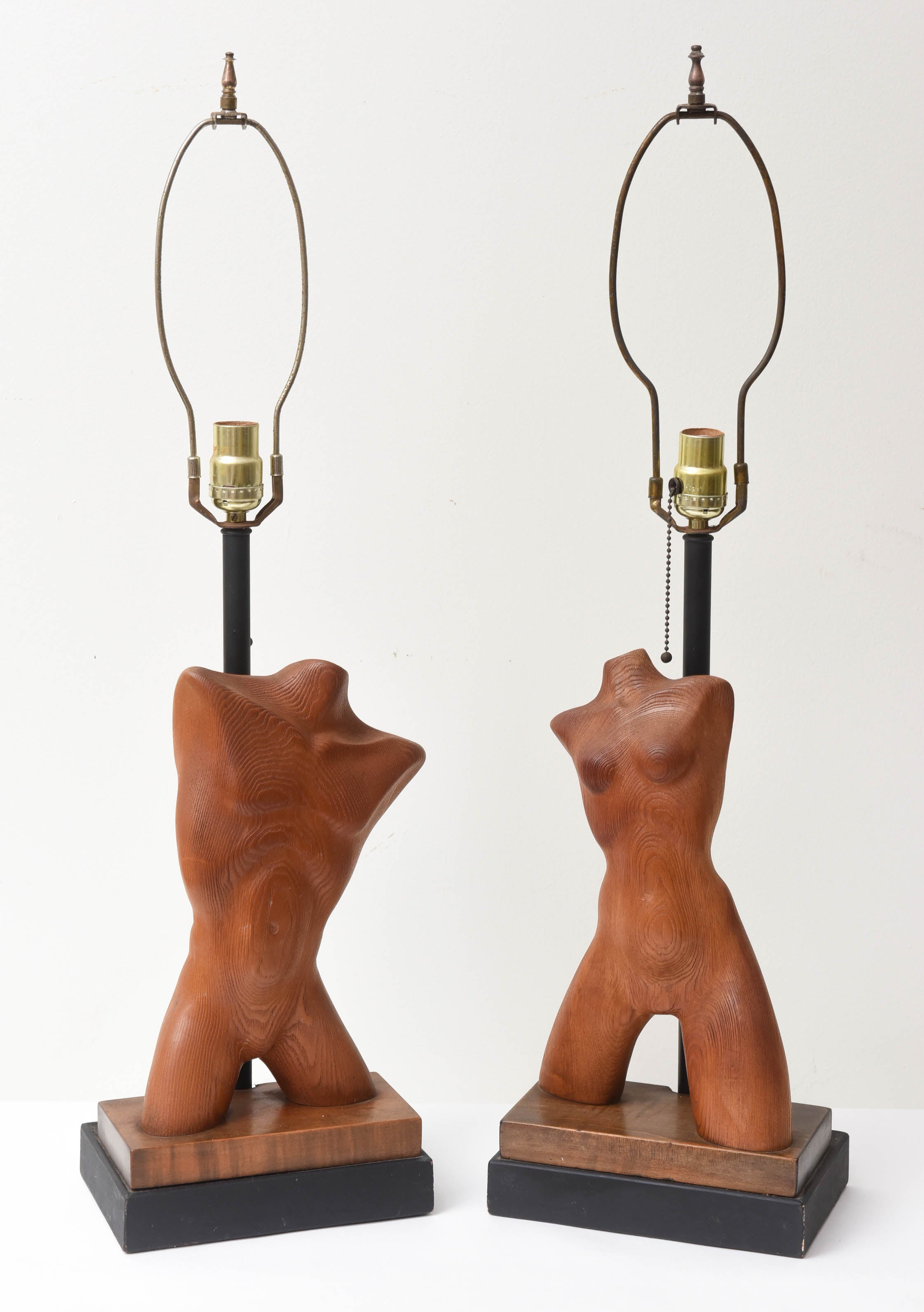 Pair of Carved Male and Female Heifetz Lamps