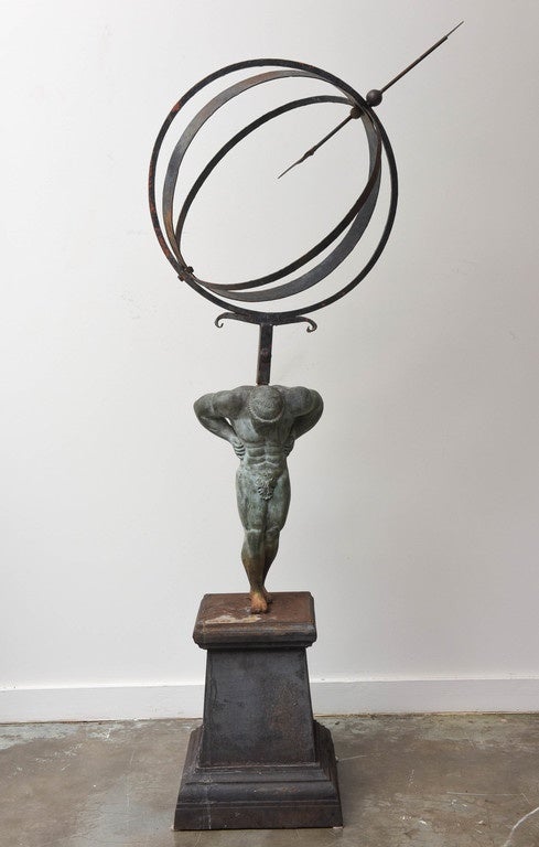 Fabulous turn of the century French bronze garden Atlas with iron base and armillary.