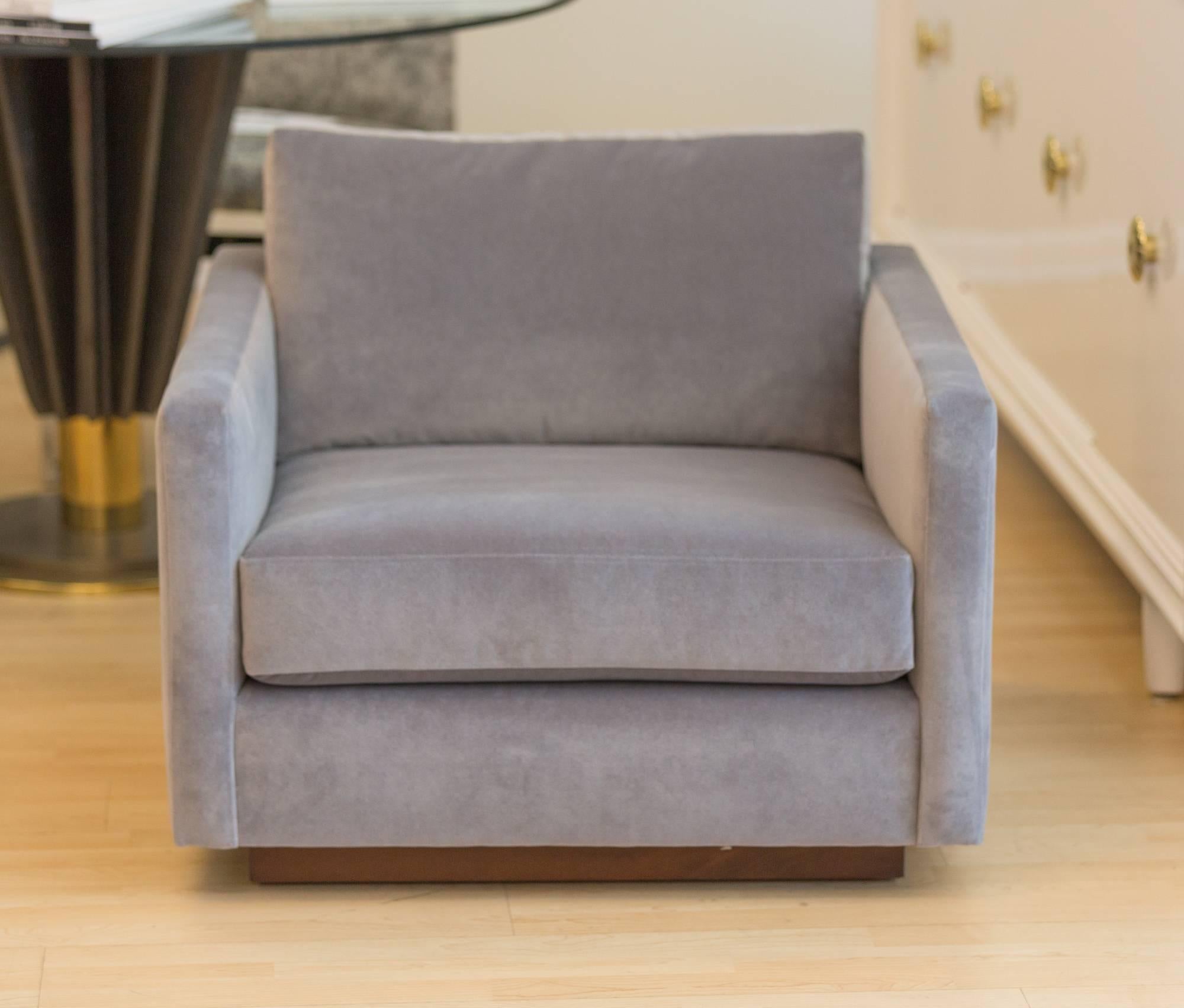 Pair of Lounge Chairs by Harvey Probber
fully reconditioned and upholstered 
in silver grey Velvet on Walnut plinth 
base.