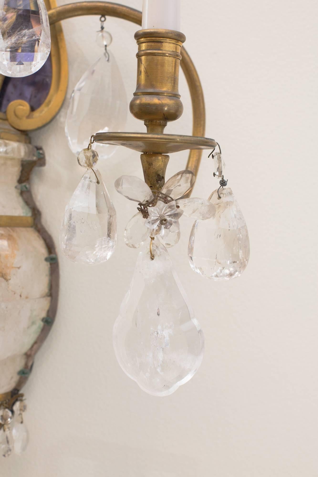 Elegant pair of rock crystal sconces by E. Caldwell for Tiffany Co.
with cobalt blue mirror reflector, hand-carved solid rock crystal.
Gilt bronze mounting plate with three candelabra lights.
Rewired.
 