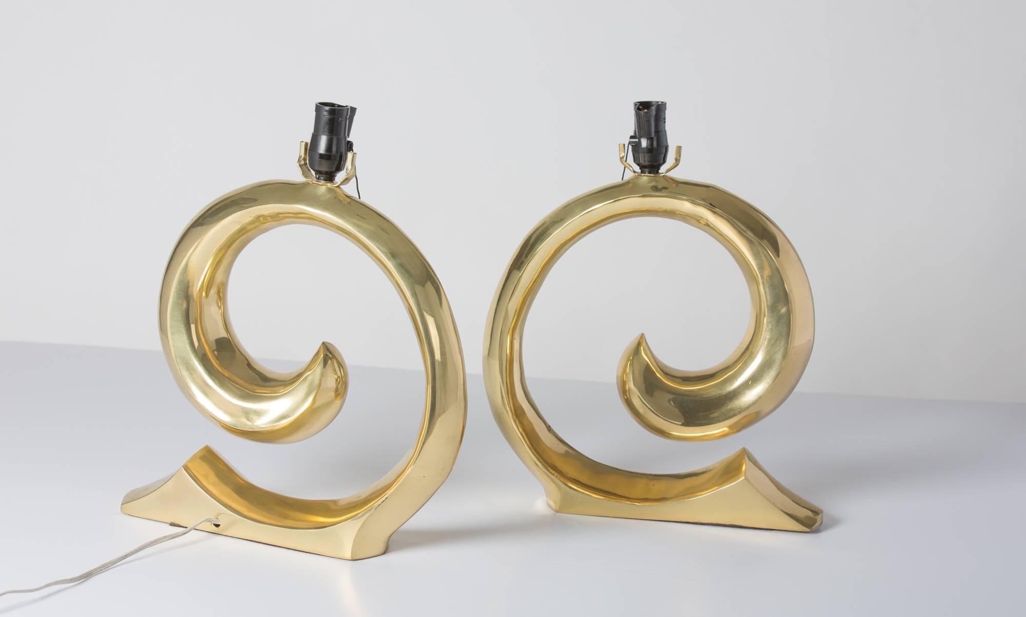 Signature brass table lamps by Pierre Cardin
with original double sockets.