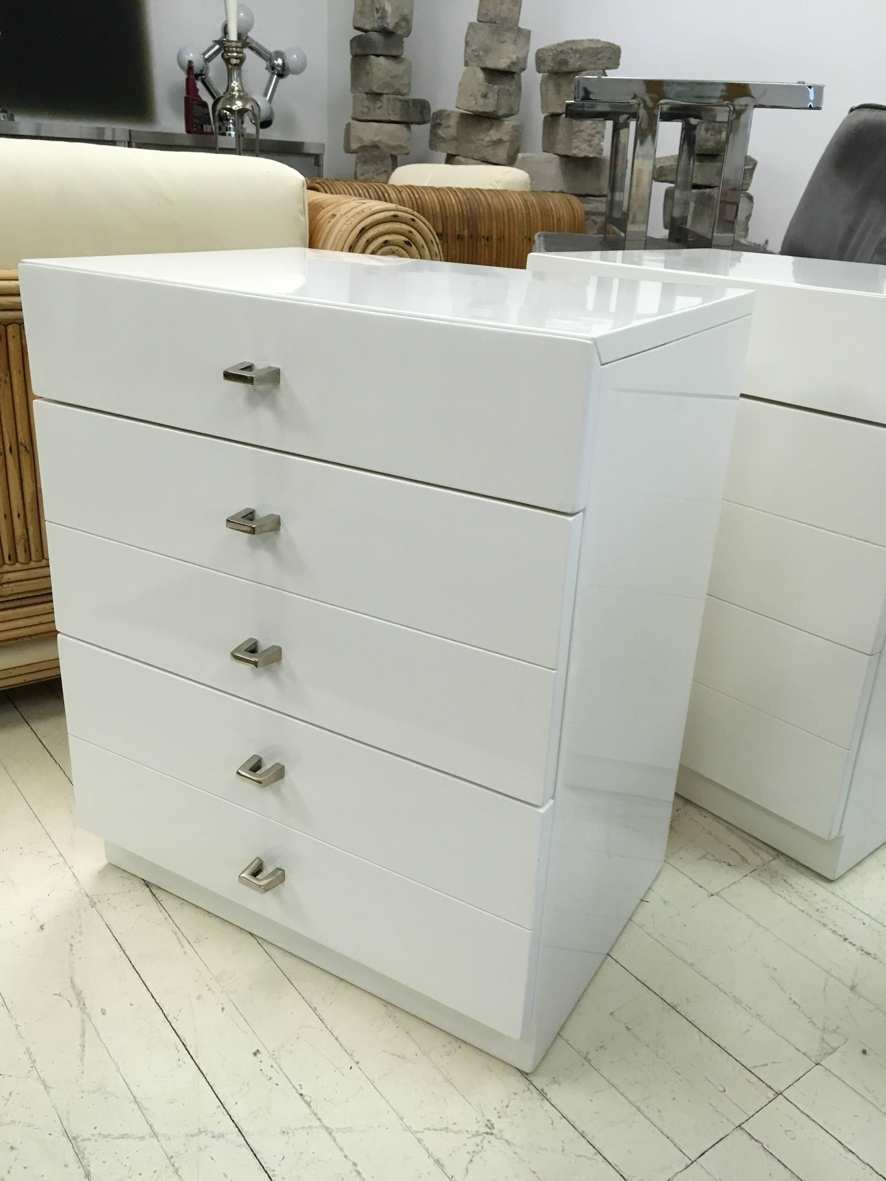 Pair of 3 drawer nightstands by Milo Baughman,
with nickel original pulls and fresh coat of high gloss lacquer.