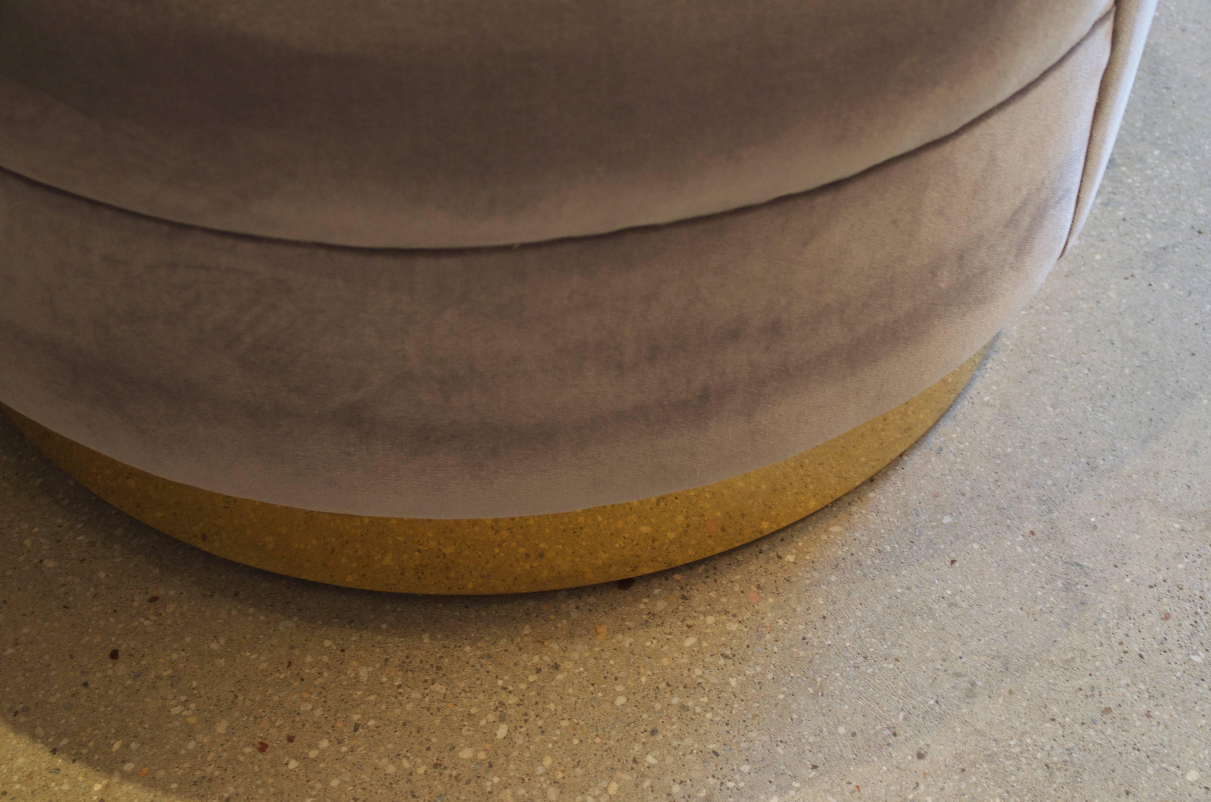 Pair of swivel chairs by Karl Springer
with new velvet upholstery and 
polished brass base.