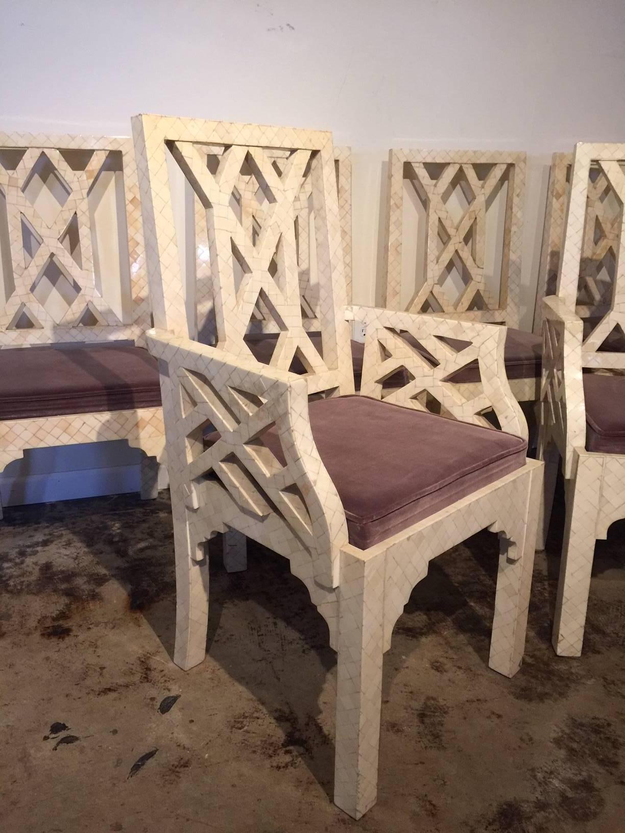 Veneered in ivory toned bone these Chippendale style dining chairs have two arm chairs and 4 armless.  Original brown velvet seats. Armless chair dimensions: 39 inches tall, 18.25