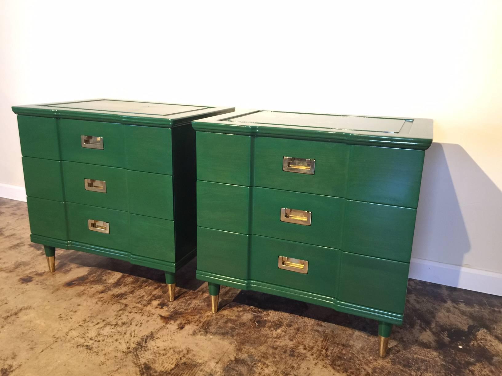 Stylish side tables or nightstands by John Widdicomb in Kelly green lacquered finish. Three ample drawers to each and polished brass original hardware, bonus of brass sabots to feet.