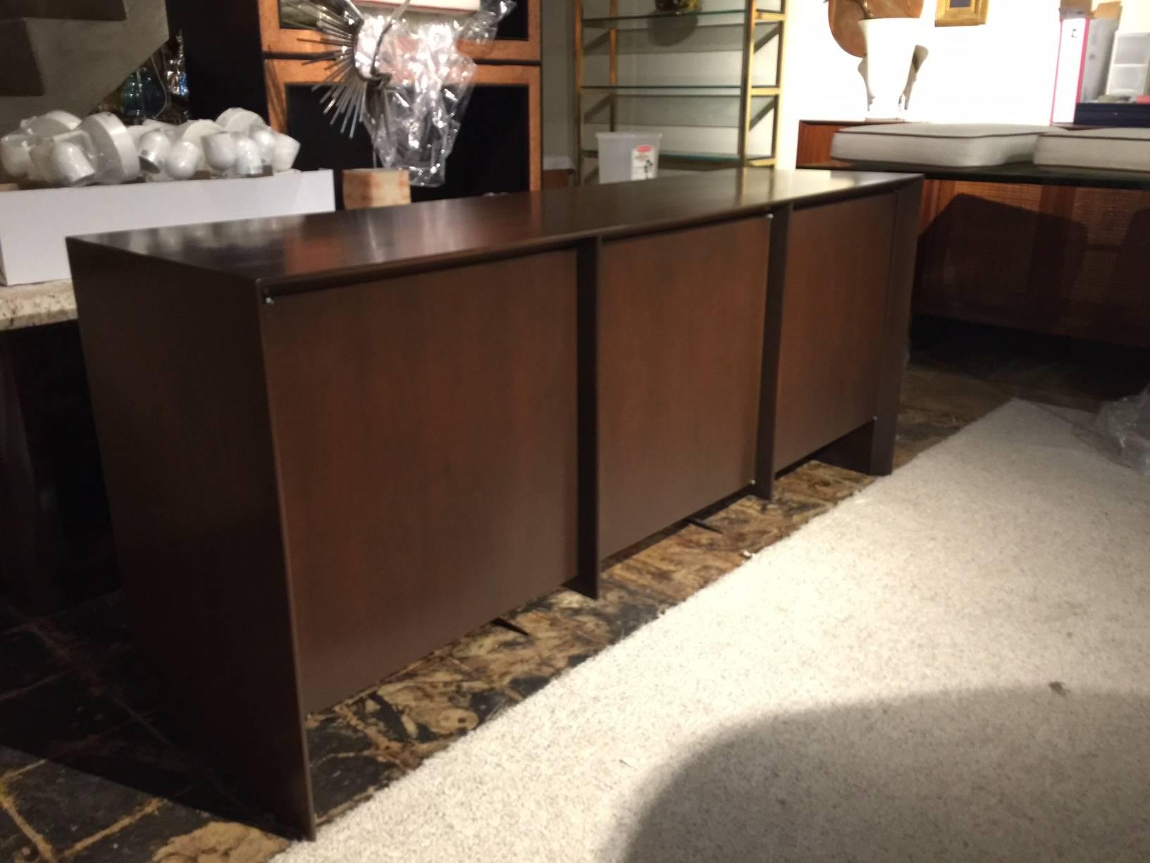 Rich Espresso finished walnut with six drawers total to interior and open storage to right side door.

This item is currently in our MIAMI showroom. Please call or email us directly for details or shipping quote.