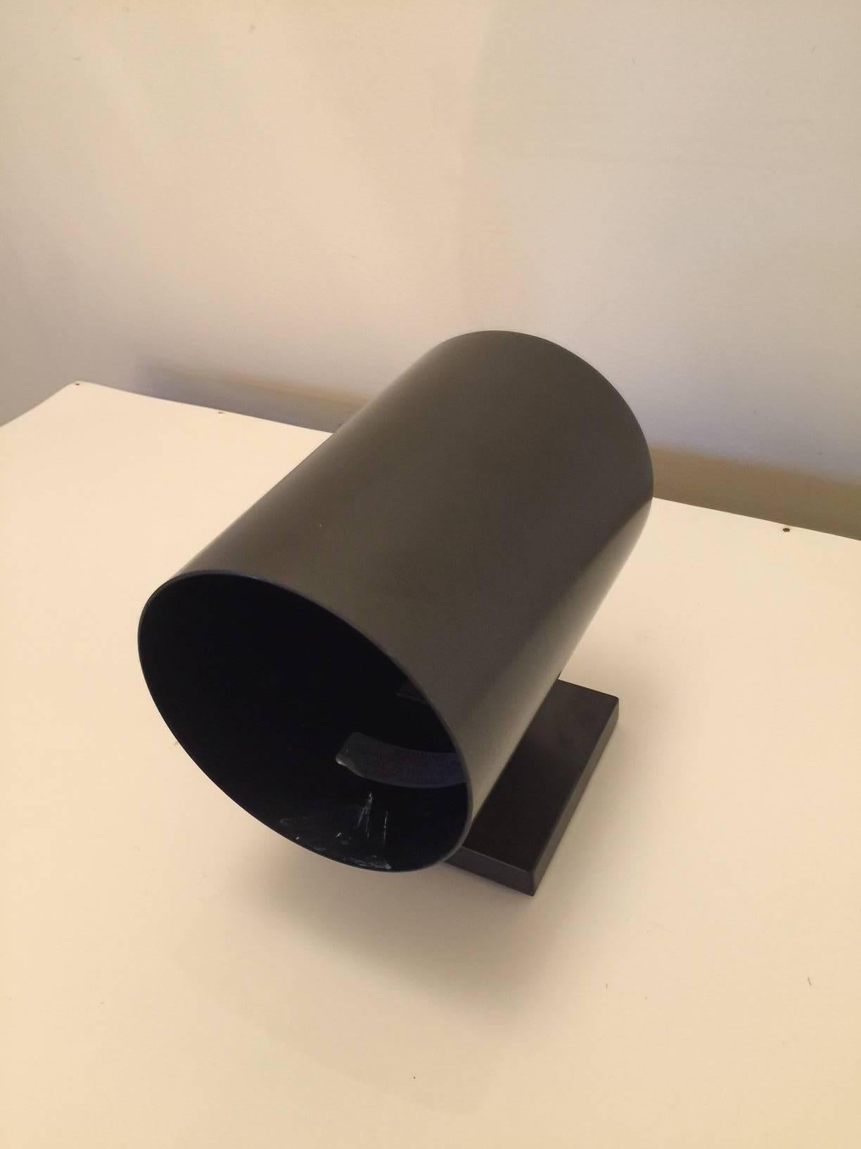 These are bronze finish powder coated metal cylindrical wall lights with a single bulb (max wattage 100). They can be down-light or up-light depending on your desire/needs. Five are available. They are in as found working condition.

Note:
