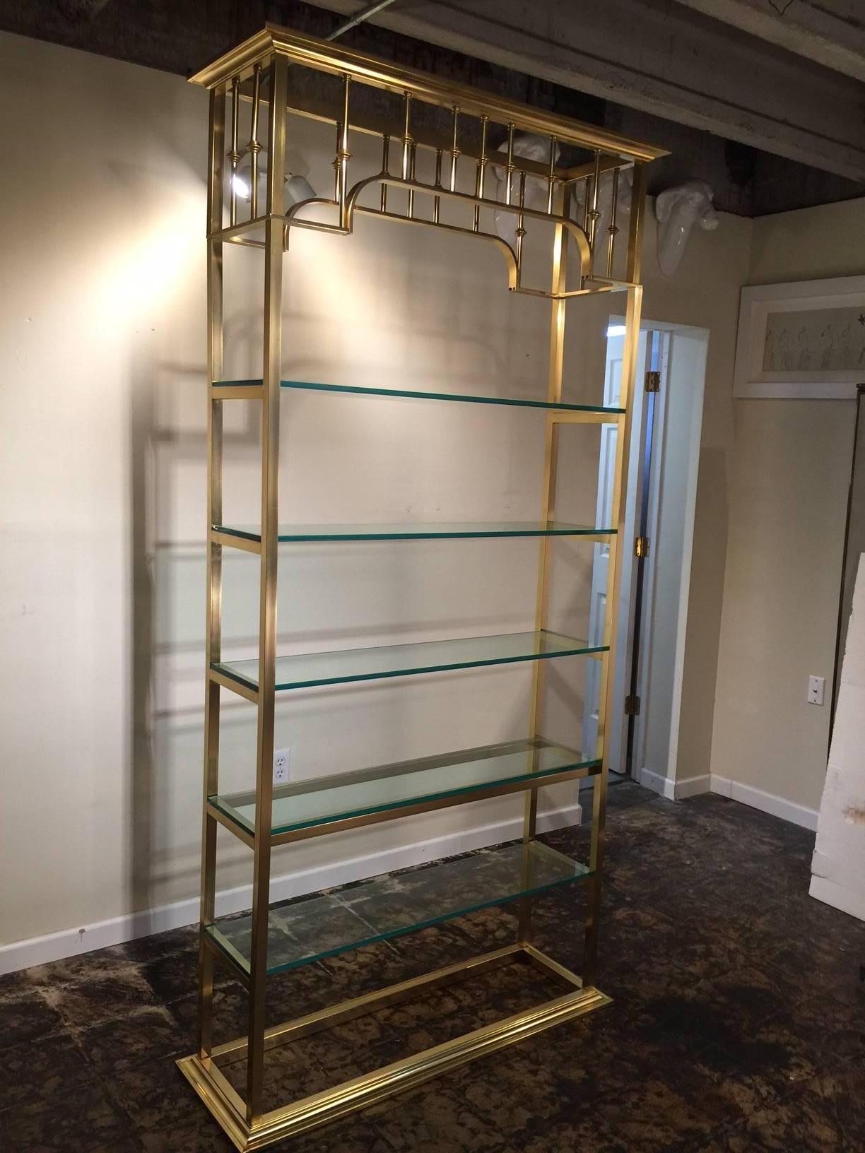 This very tall étagère shows five thick glass shelves (can take two more if desired) and is very stable. This design is truly chic!