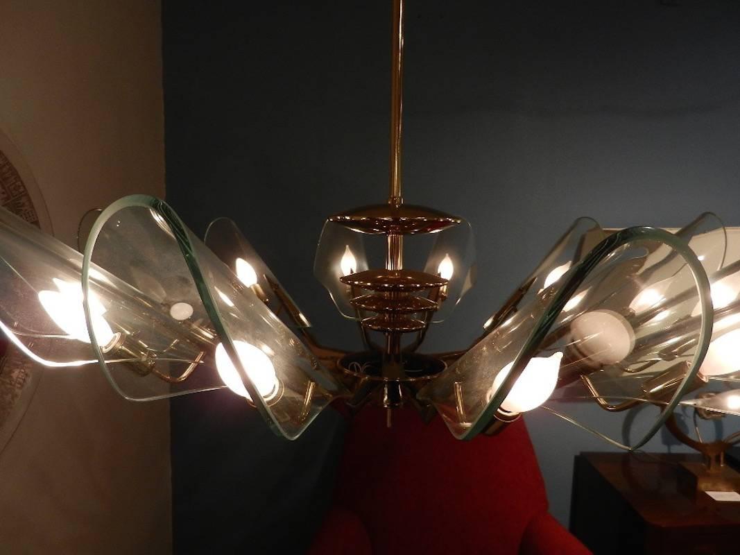 Pair of 12 Light Mid-Century Chandeliers Attributed to Stilnovo circa 1960 In Excellent Condition For Sale In New York, NY