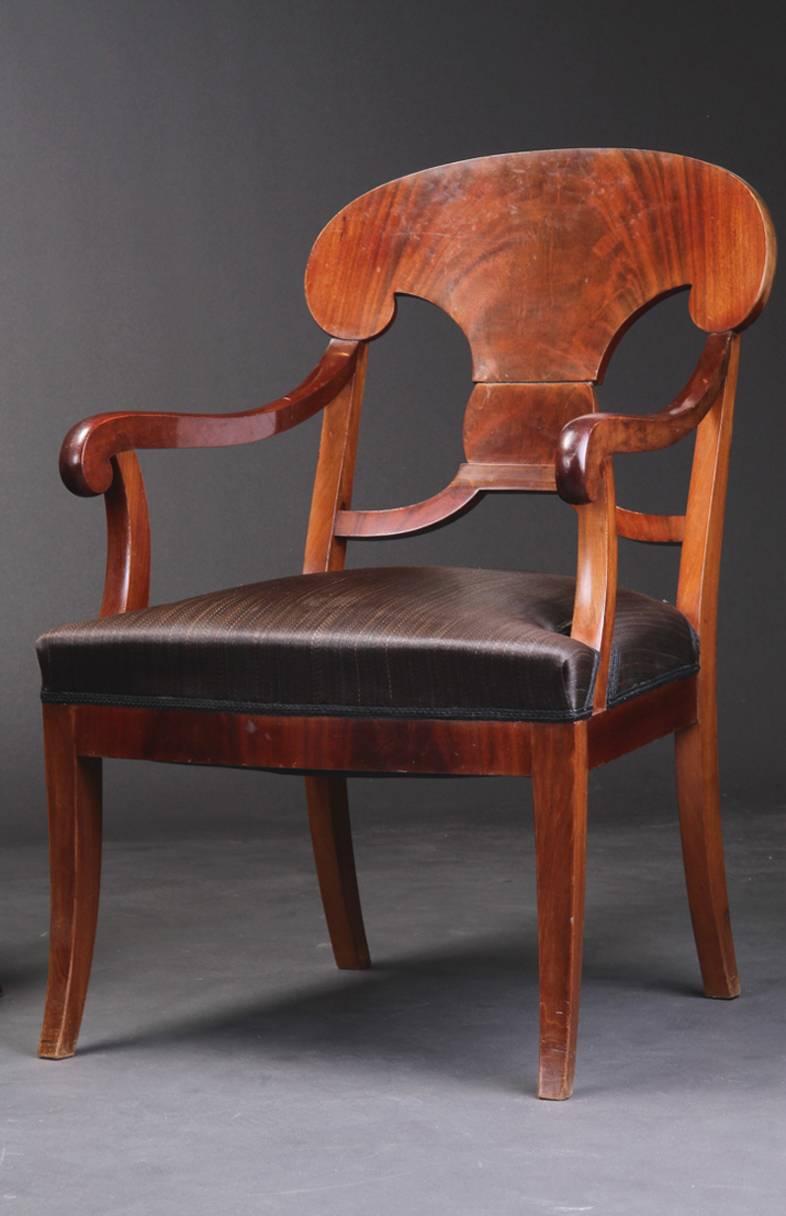 Set of four Danish 19th century figured mahogany neoclassical armchairs with horsehair seats. Note: Will sell as pairs.