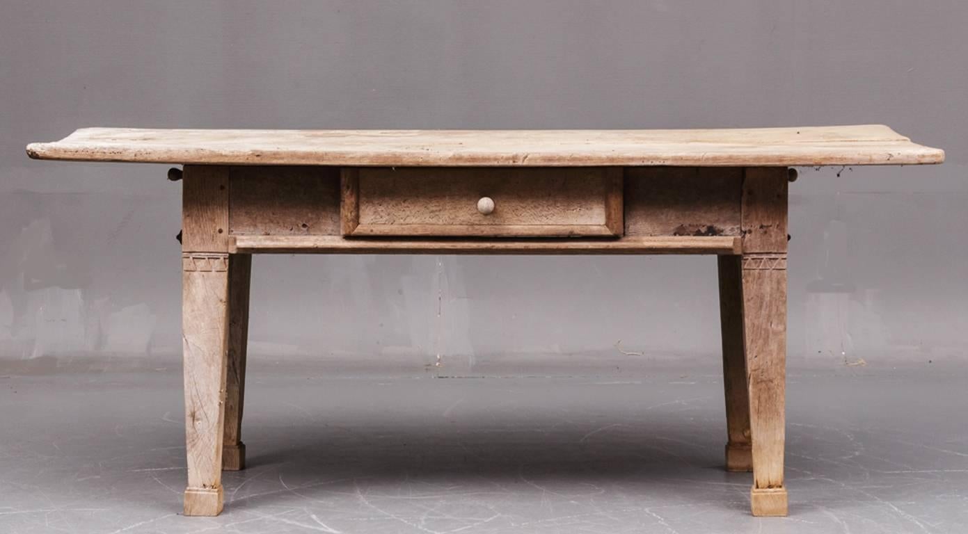 Scandinavian rustic chip-carved oak dining farm/tavern table with single pull-out drawer, circa 1800 or earlier.