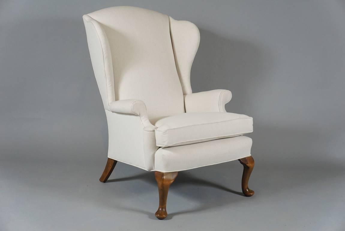 Pair of small-scale wing chairs, Danish, early 20th century. The chairs newly upholstered and very comfortable.