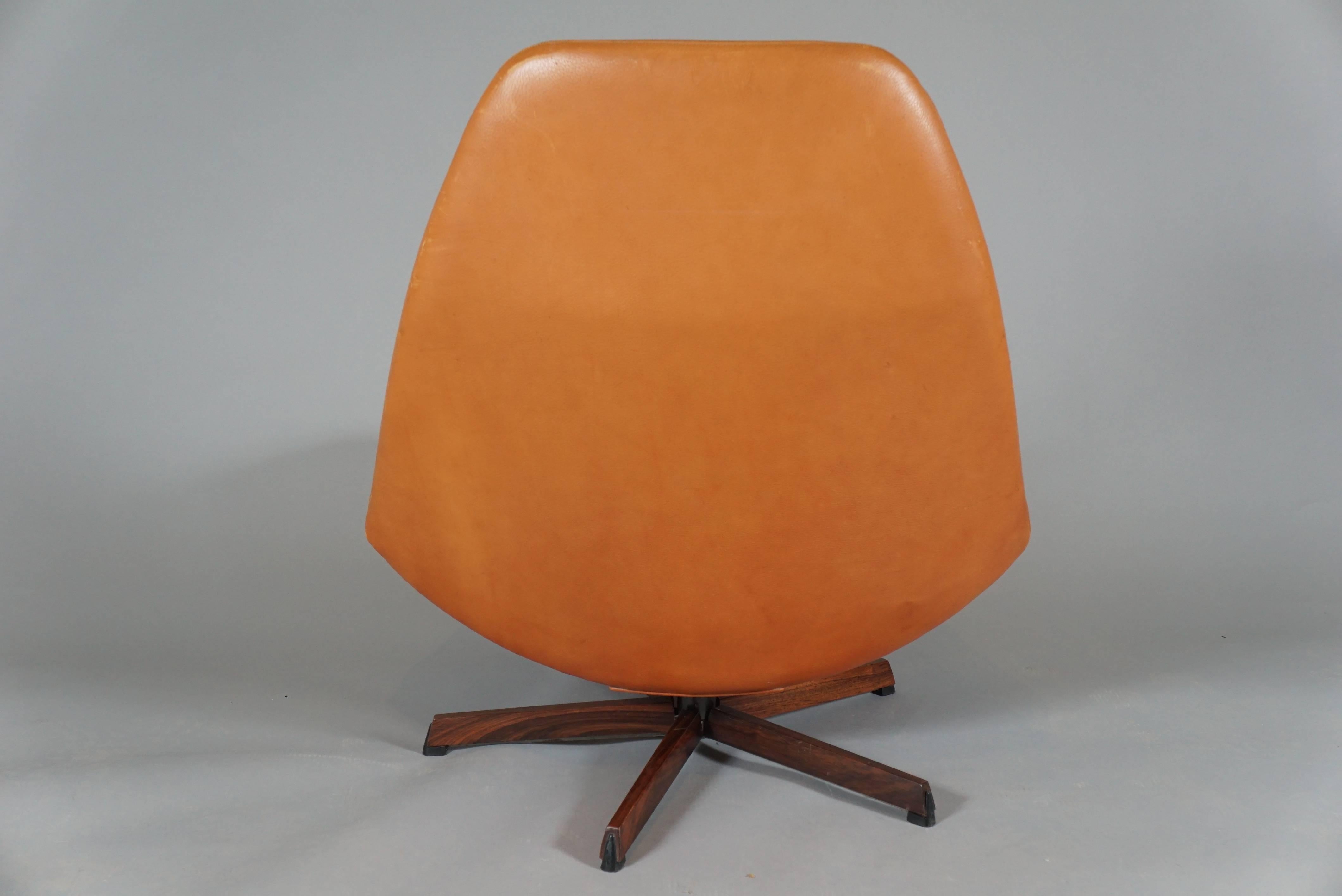 Danish Pair of Swivel Chairs and Ottomans by Madsen & Schubell
