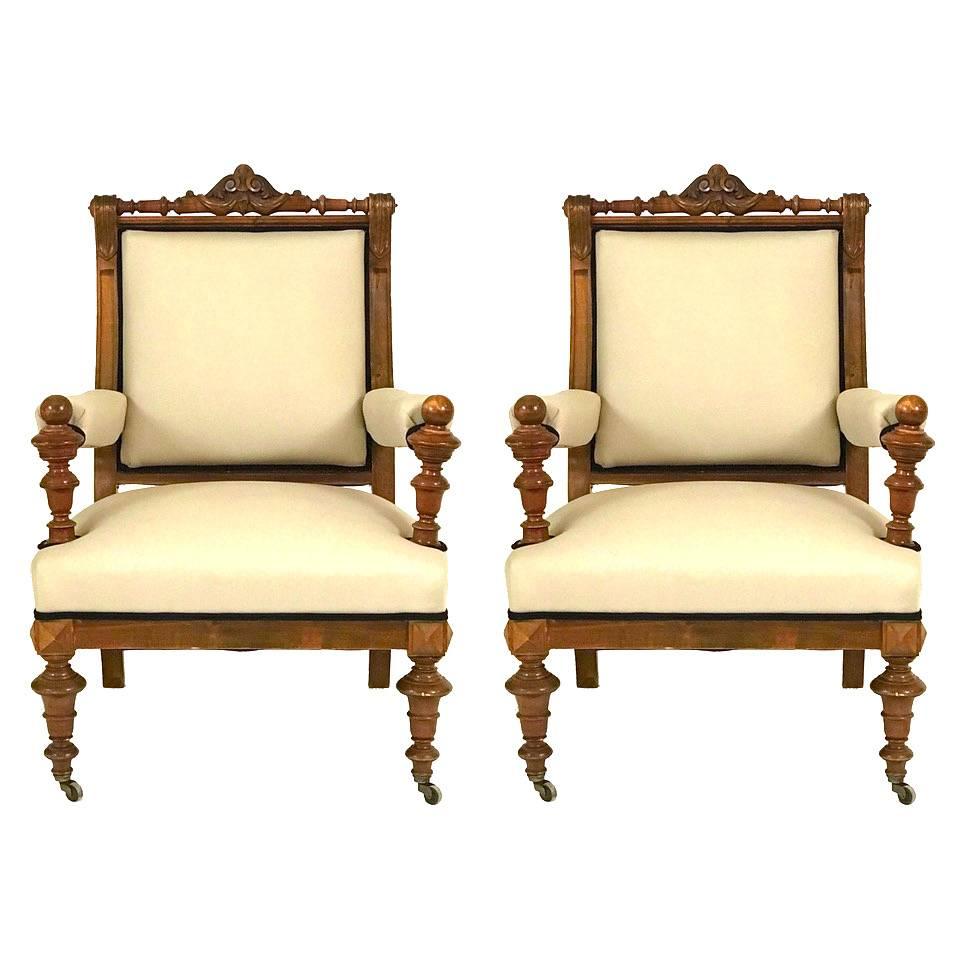 Pair of Danish 19th century walnut throne style armchairs. Aesthetic movement, 1870s-80s. The chairs newly upholstered in linen. 