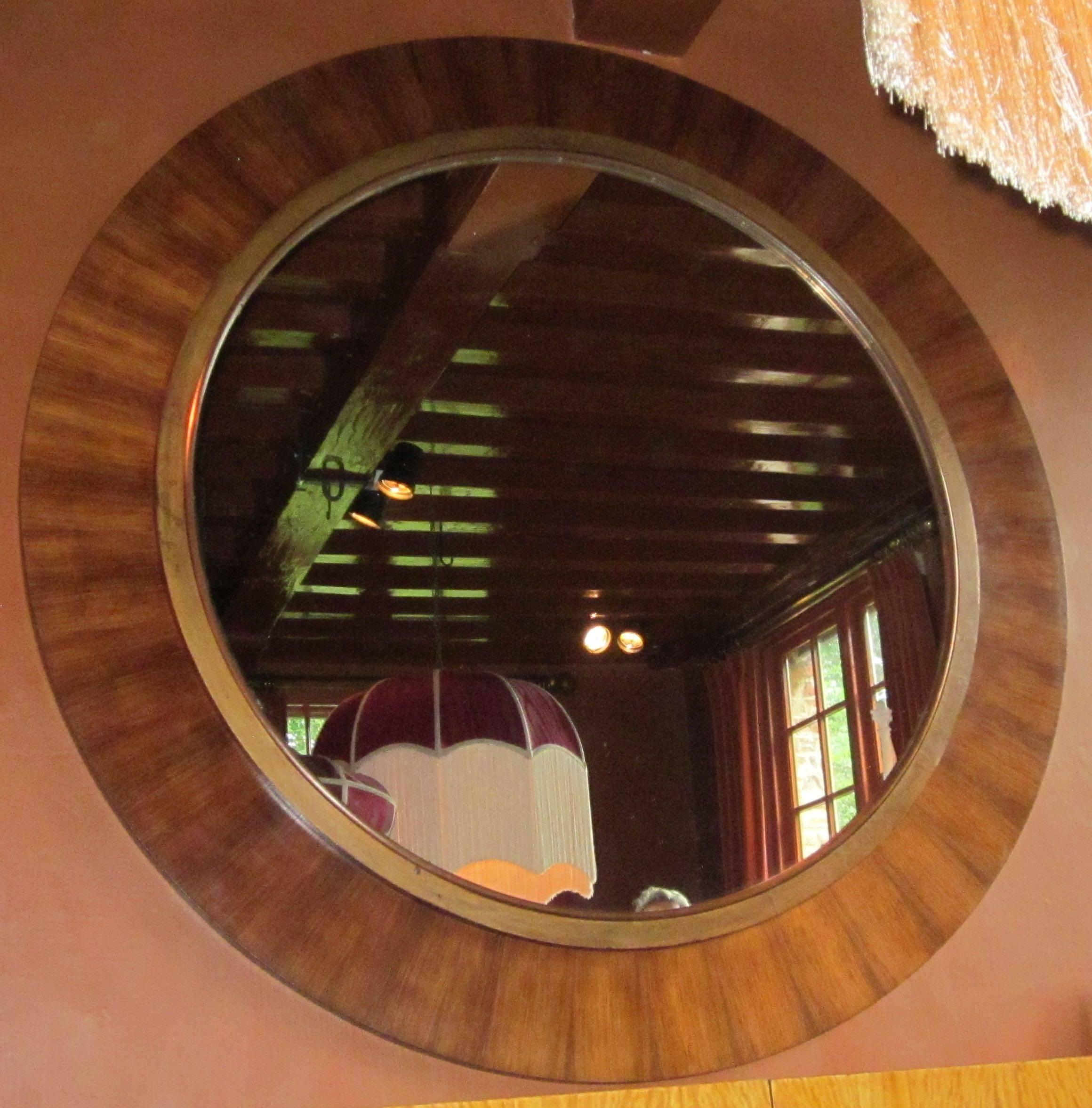 Mid-Century French extra large round mirror with rosewood border.
Mirror only diameter 56