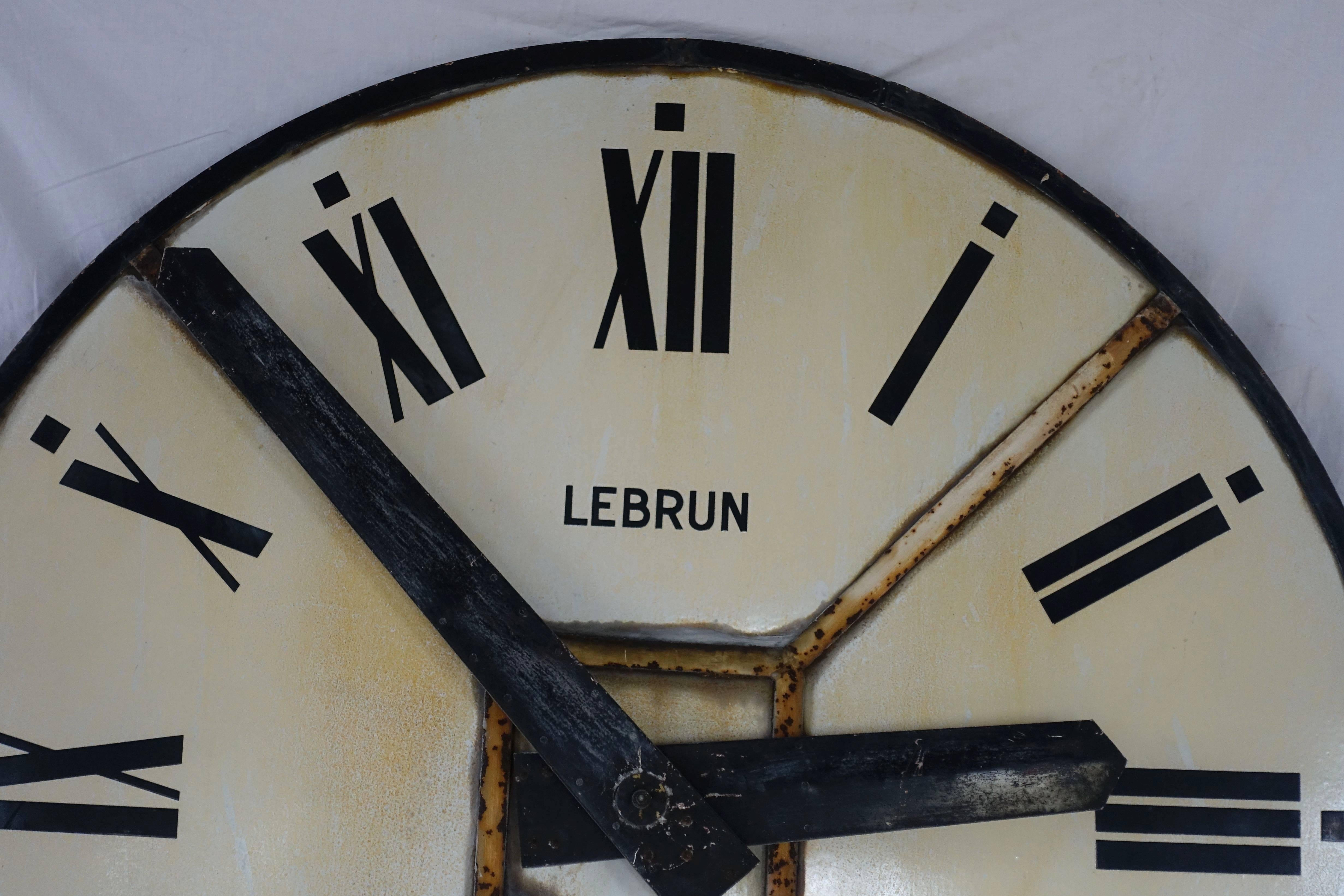 Extra large French clock face with Roman numerals.
The clock is inscribed Lebrun Signy.
It is a decorative, non functioning clock face.