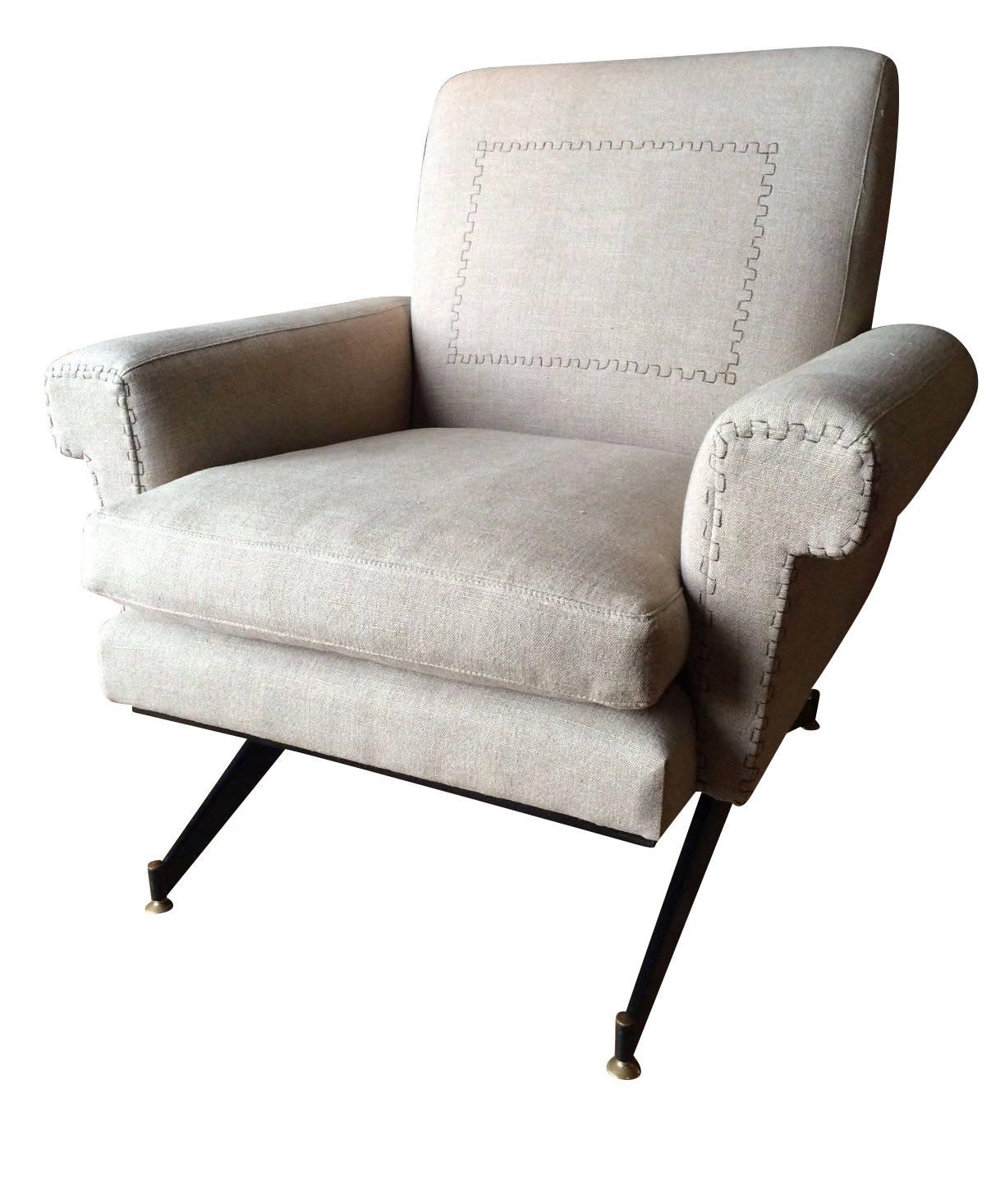 Mid-Century pair of recently reupholstered club chairs.
Neutral inen upholstery with decorative 