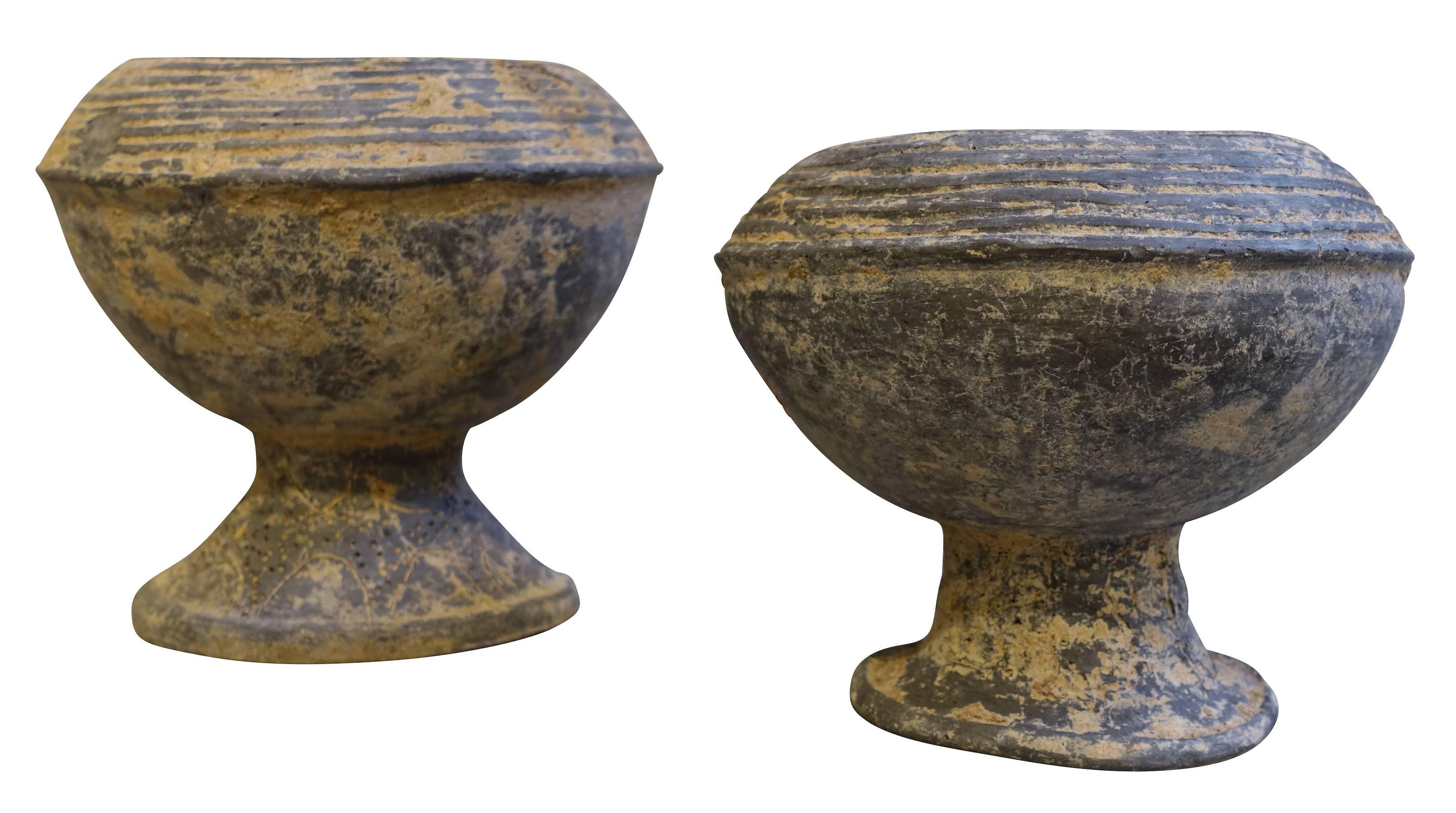 18th century vases from the Khmer people of Cambodia.
Decorative ribbed details.
Weathered with beautiful natural patina.
Two available ( S4697 and S4698 )
S4697 measures 8 inches diameter x 6 inches height
S4698 measures 8 diameter x 7