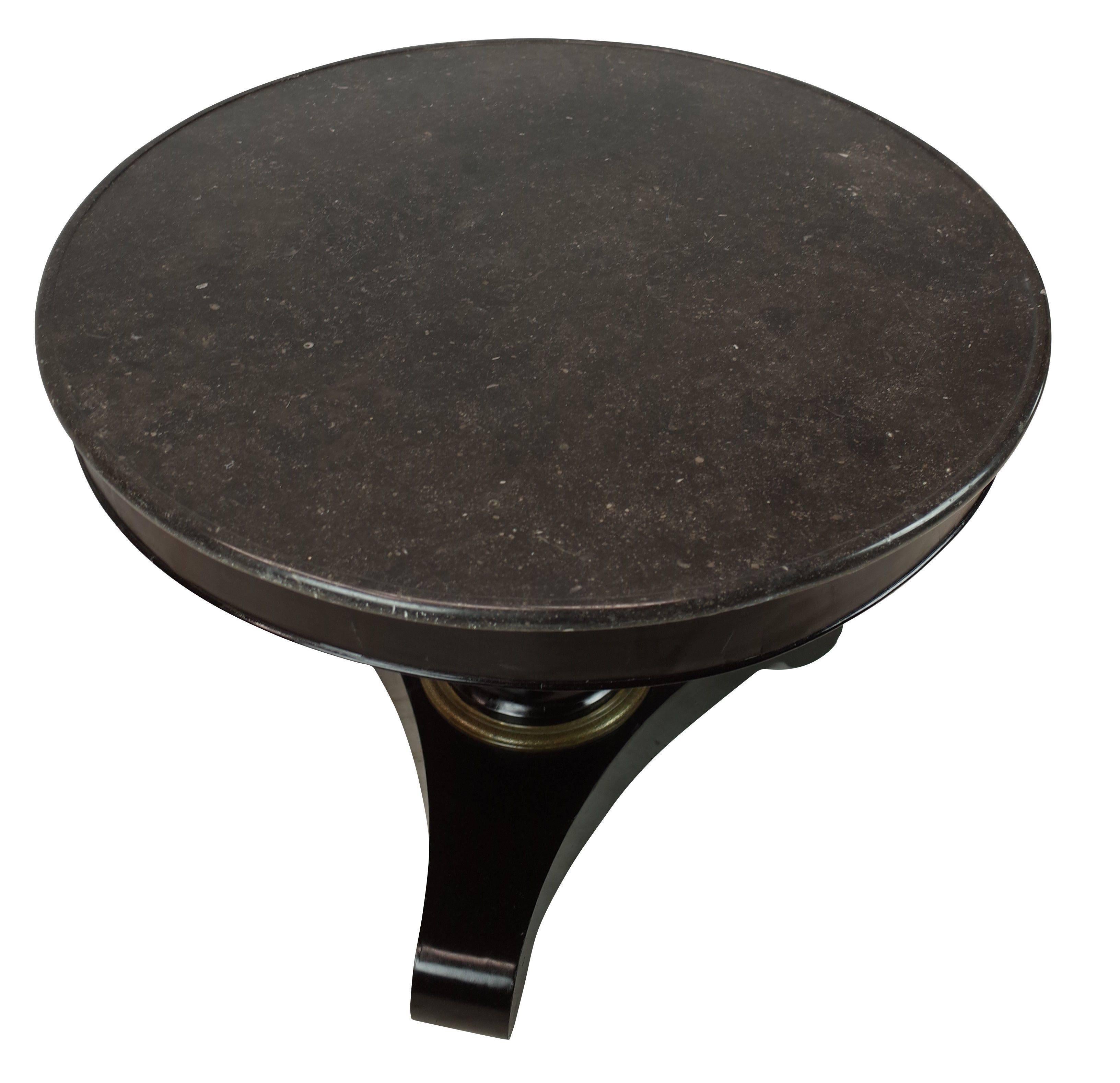 French 19th century gueridon in ebony black. Black marble top.
Brass ring bottom accent.
Arrives in August.