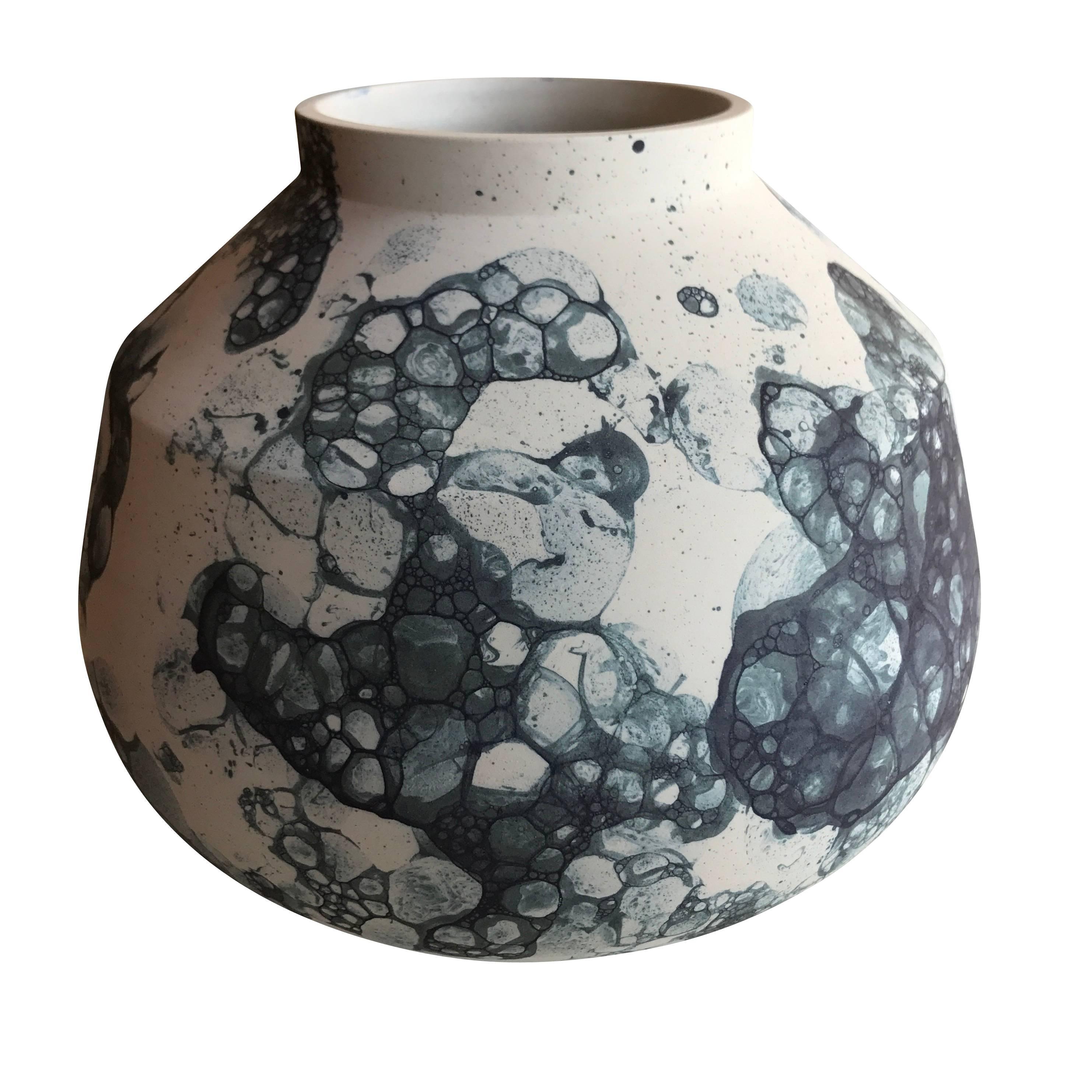 Contemporary Dutch Bubble design made from actual shades of blue bubbles adhered to ceramic vase.
 