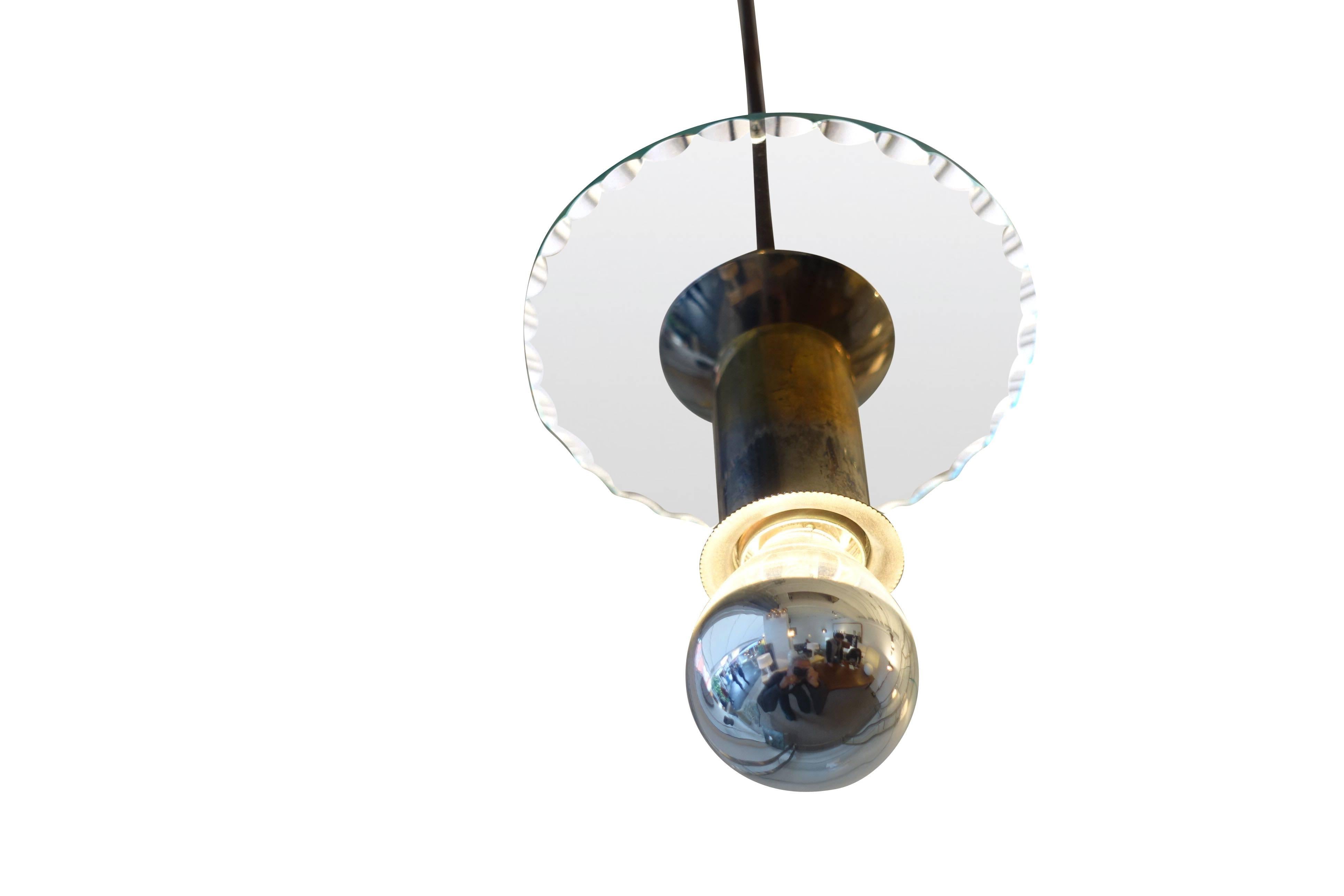 1940s Italian set of four polished nickel pendants with cut clear glass round flat cups.
     