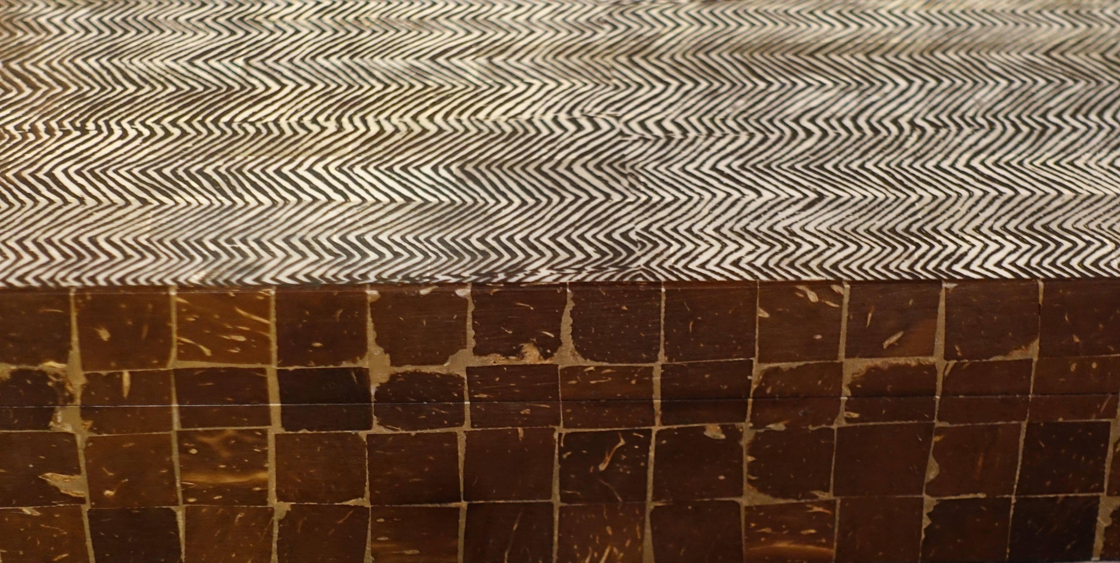 Contemporary Indonesian brown and cream herringbone pattern top with sides made of individually cut squares.
Decorative and functional.
  