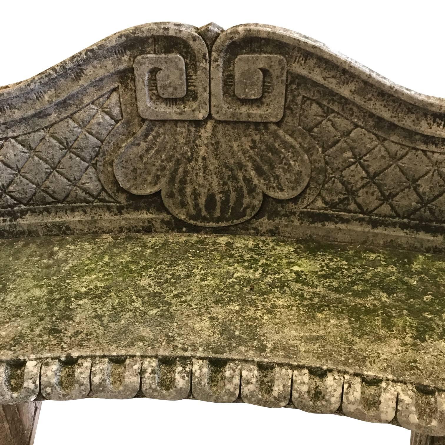 1920s Italian hand carved Vicenza curved stone bench with classic design details.
Traditional decorative details along back and sides.
Moss and spores embedded in stone give naturally aged patina.
Originally from large garden in a villa outside