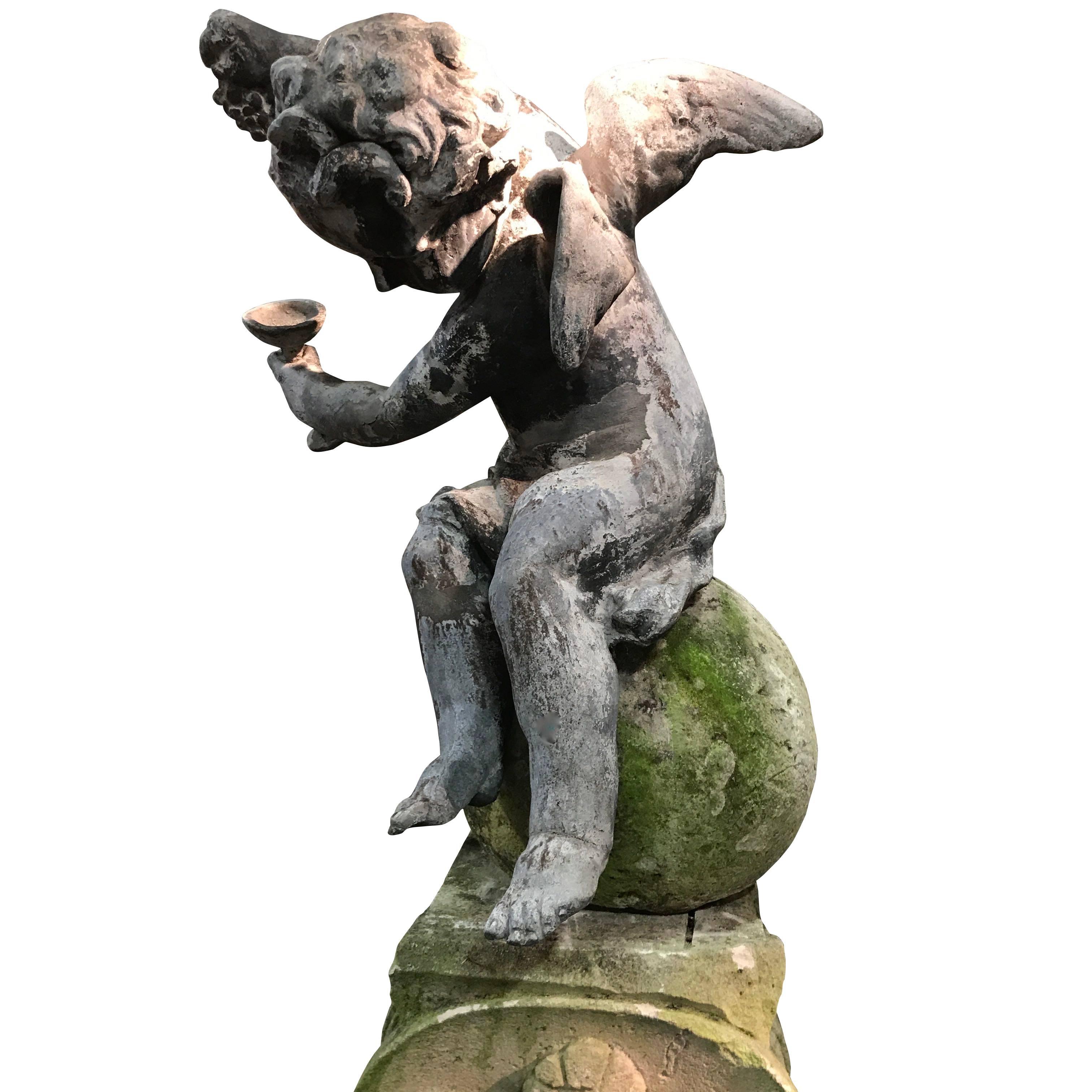 English Regency leaded cherub atop carved limestone column, circa 1820
Natural weathered patina.
Very decorative and a focal point in any garden.
Base is 17